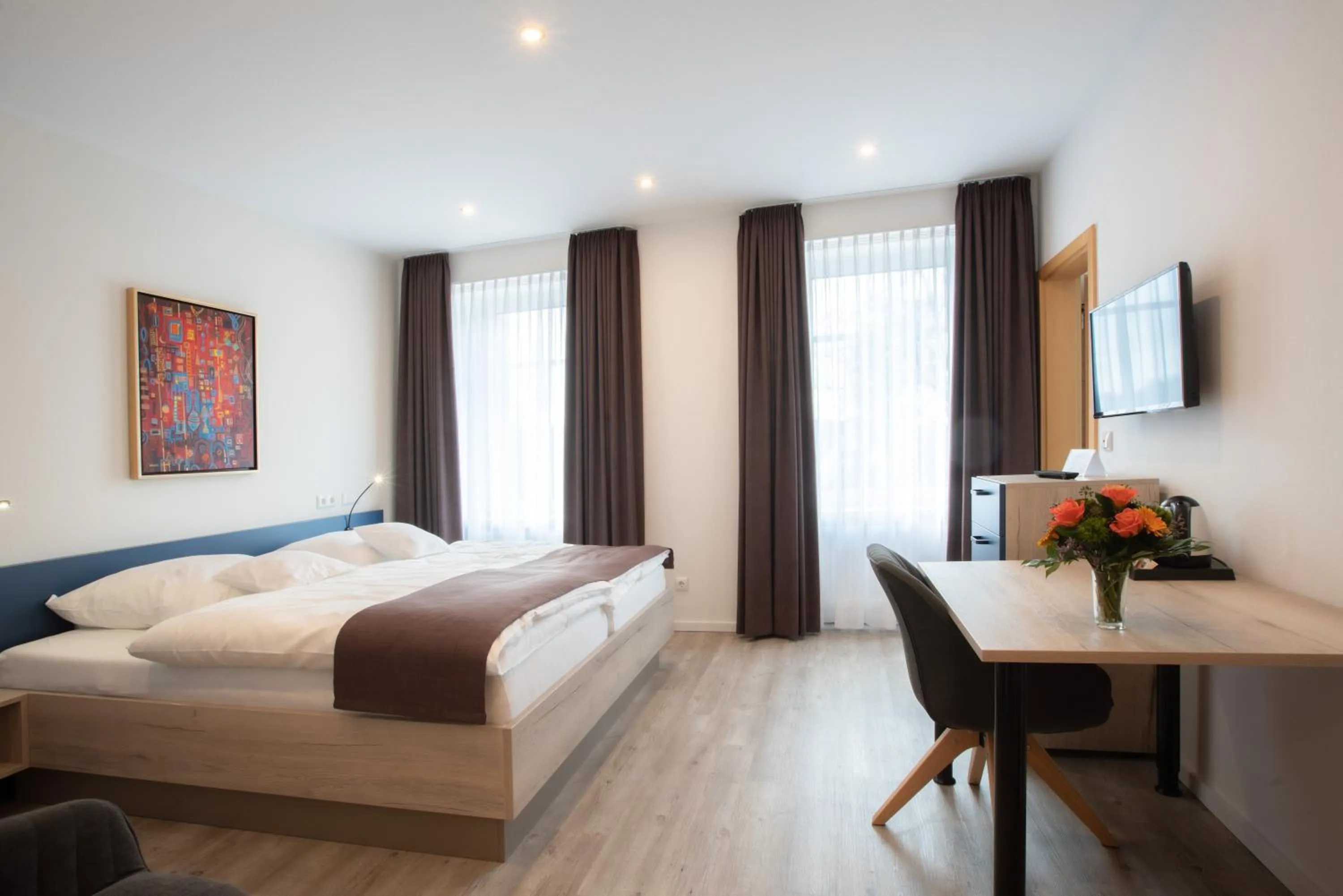 Bed in CAESARO Hotel & Pizzeria - 20 Jahre Familienunternehmen