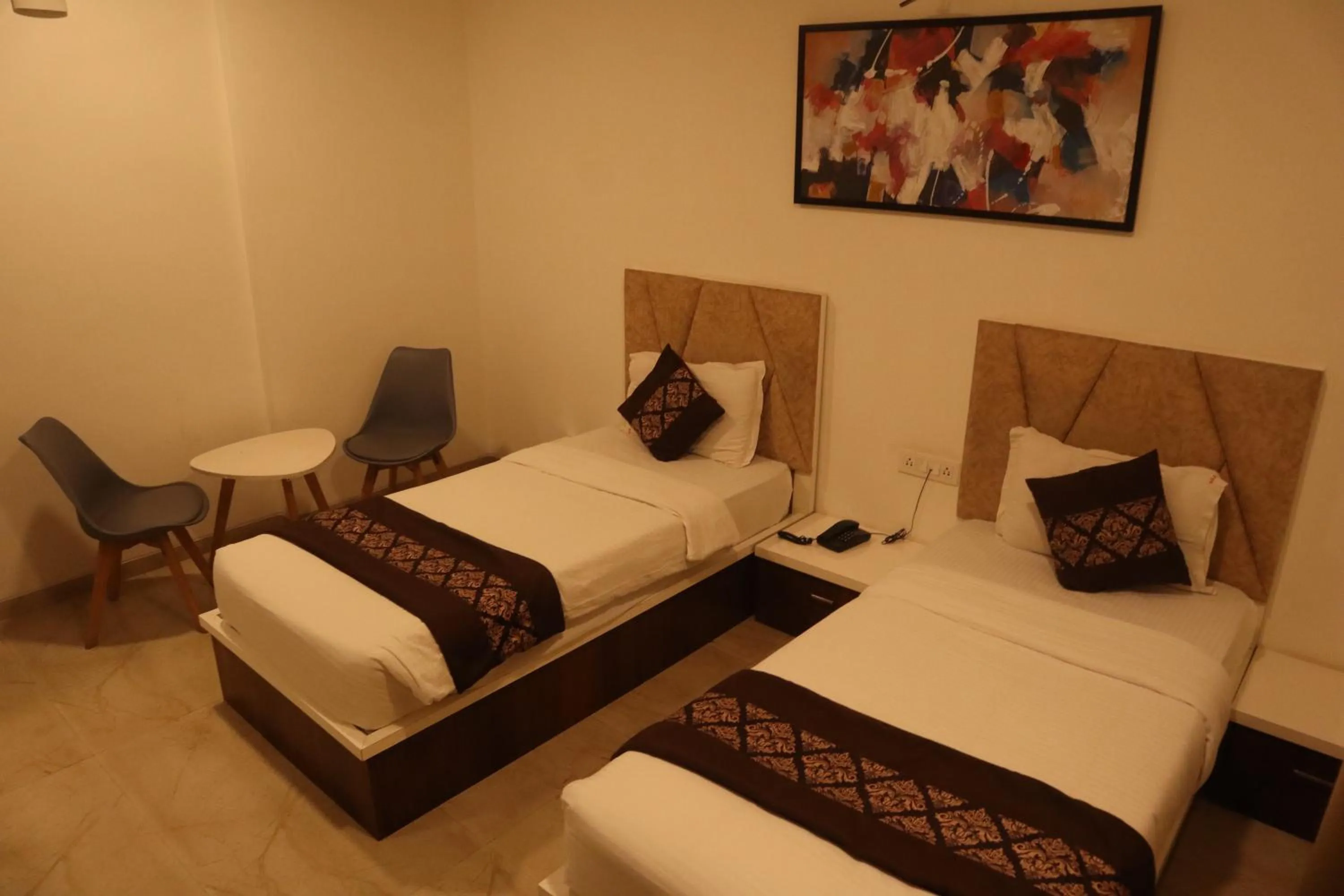 Bed in Hotel Grand Ecotel, Aurangabad