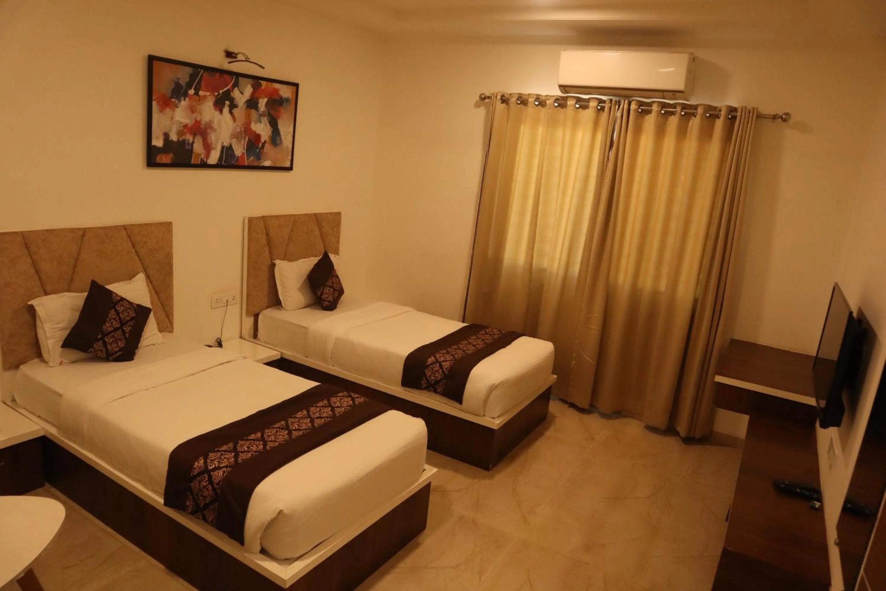 Bed in Hotel Grand Ecotel, Aurangabad