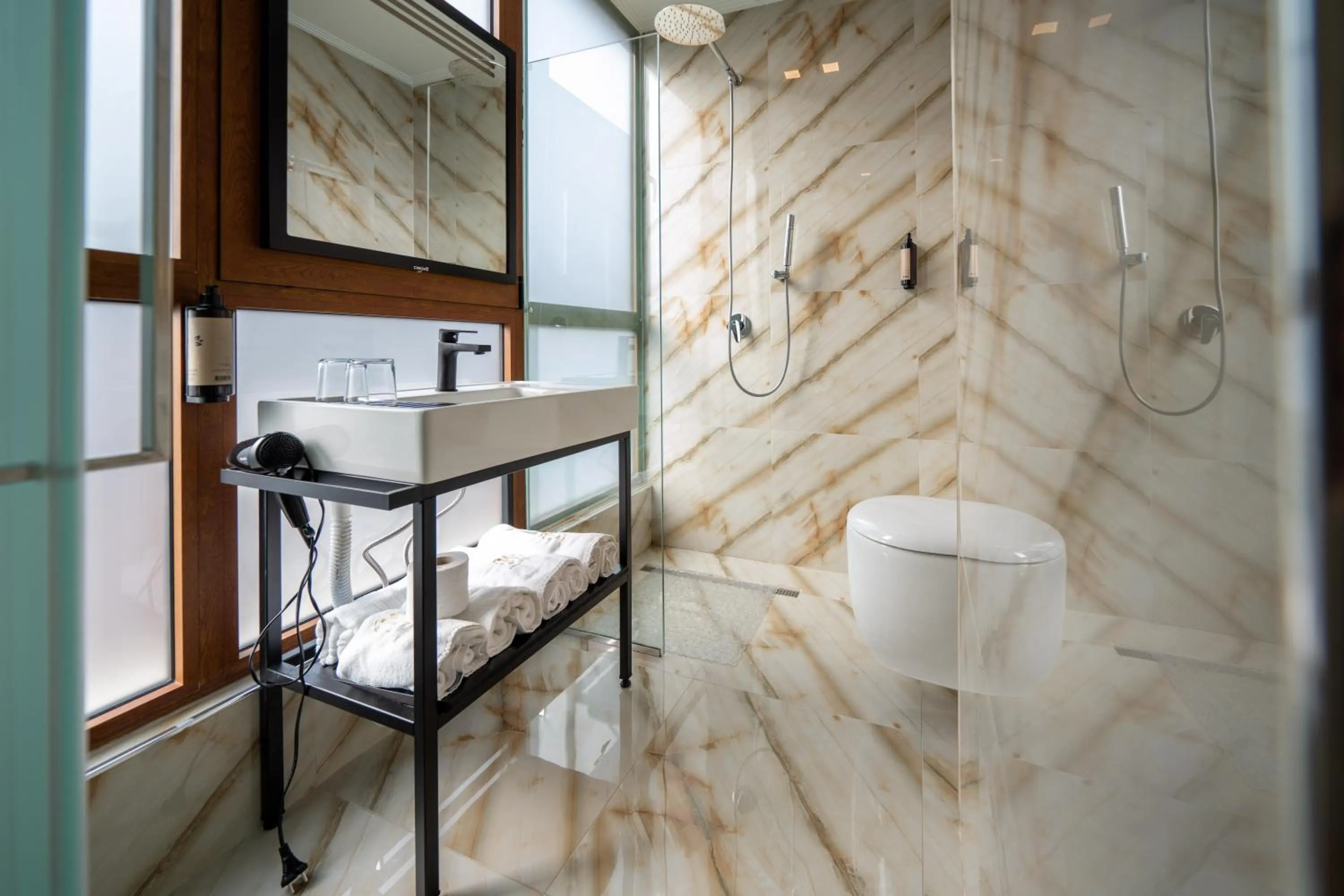 Shower in MERKO HOTEL