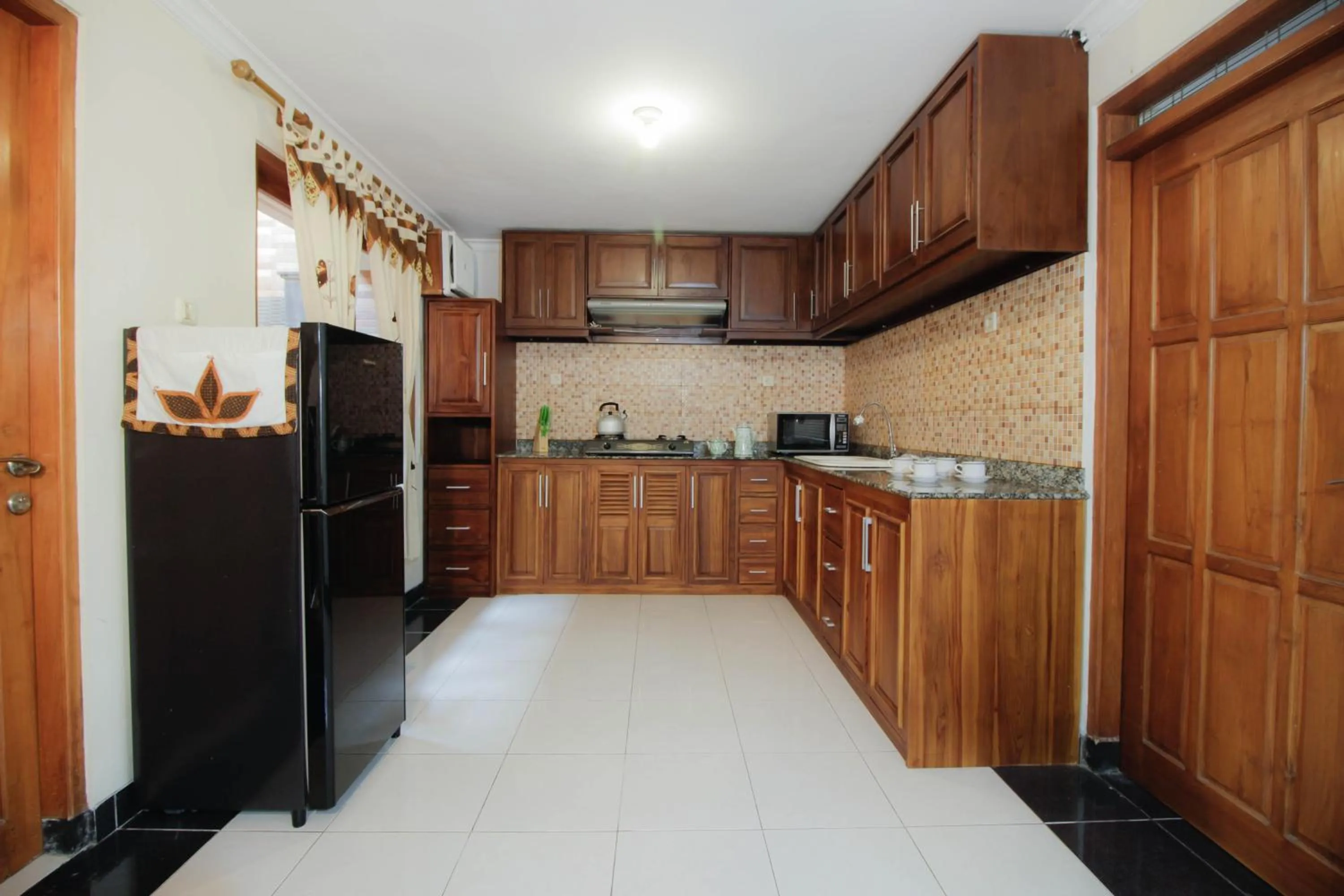 Kitchen or kitchenette in Nginap at Joy House