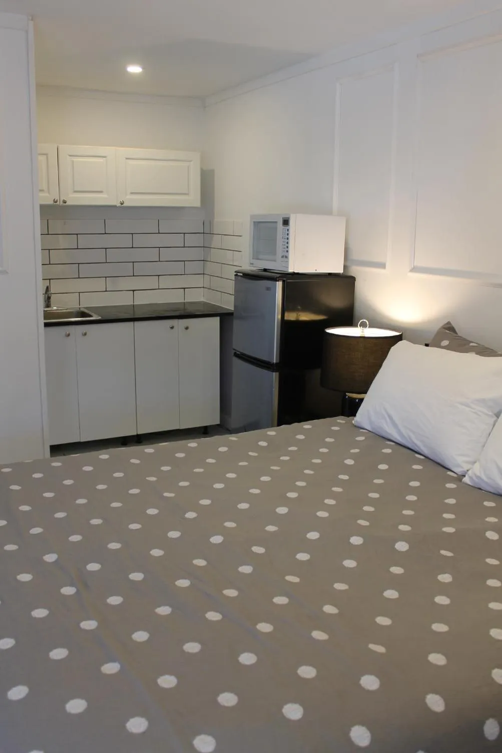 Bed in Sage Hills Motel