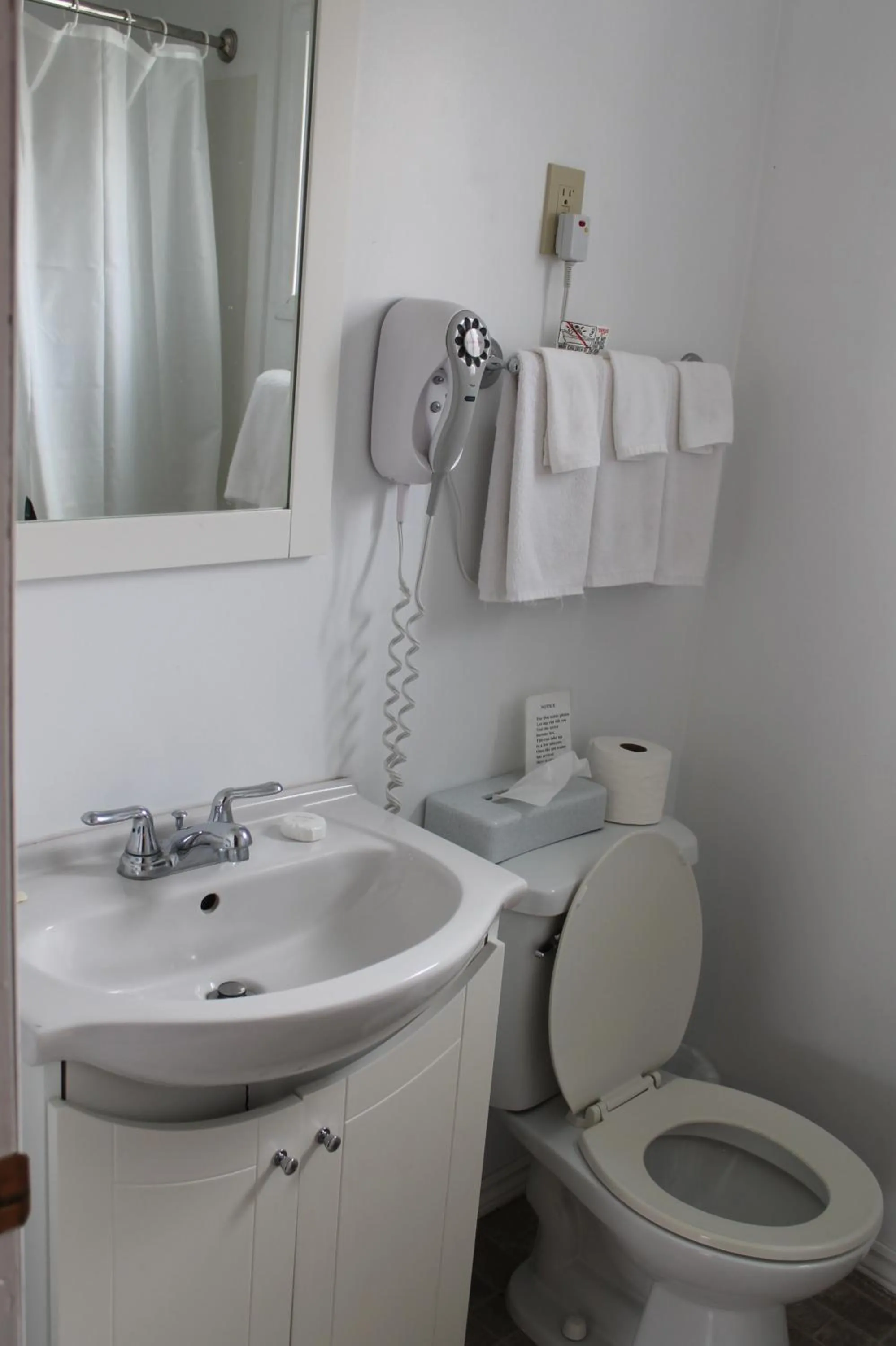 Toilet in Sage Hills Motel