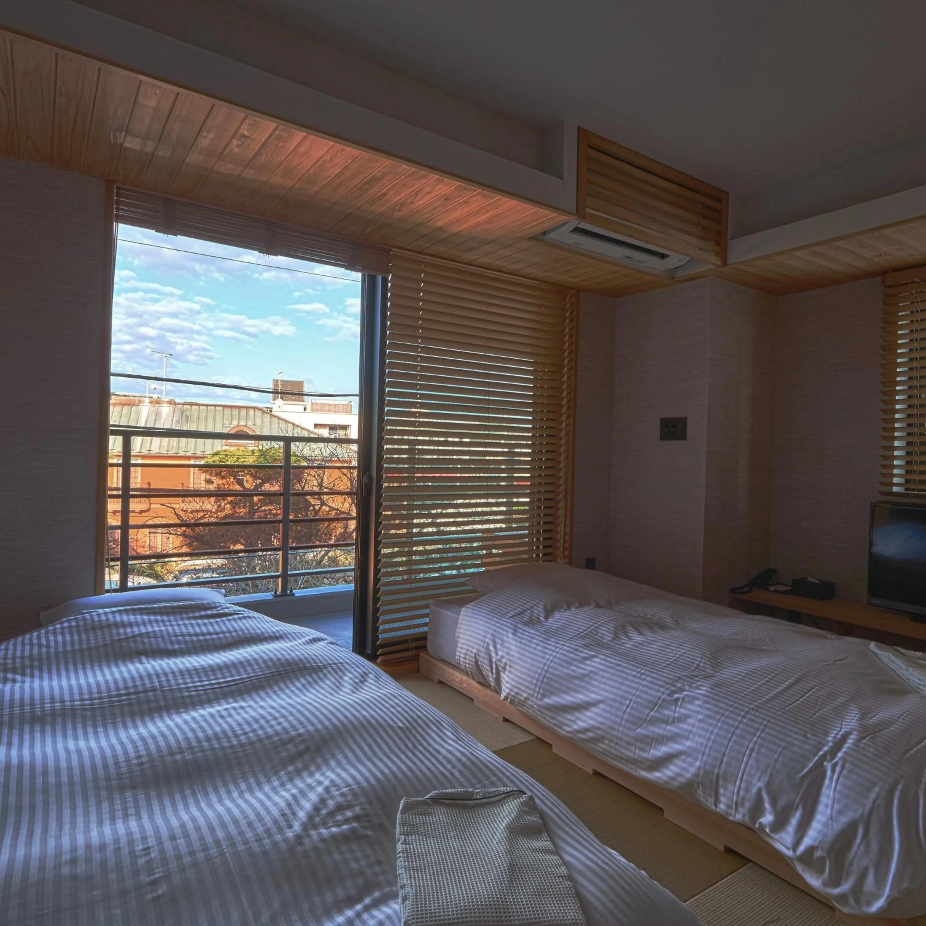 Bed in KAMAKURA Hotel