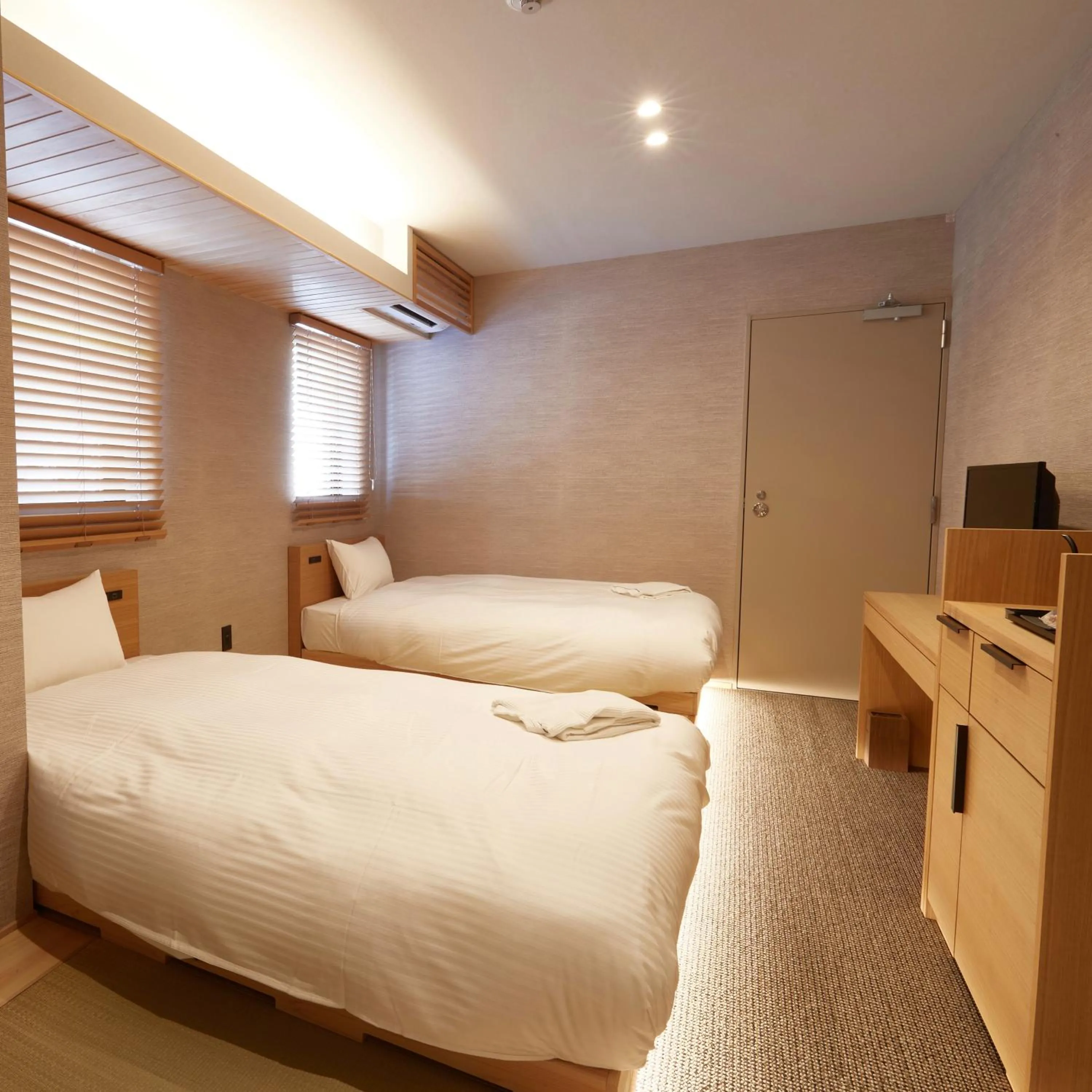 Bed in KAMAKURA Hotel