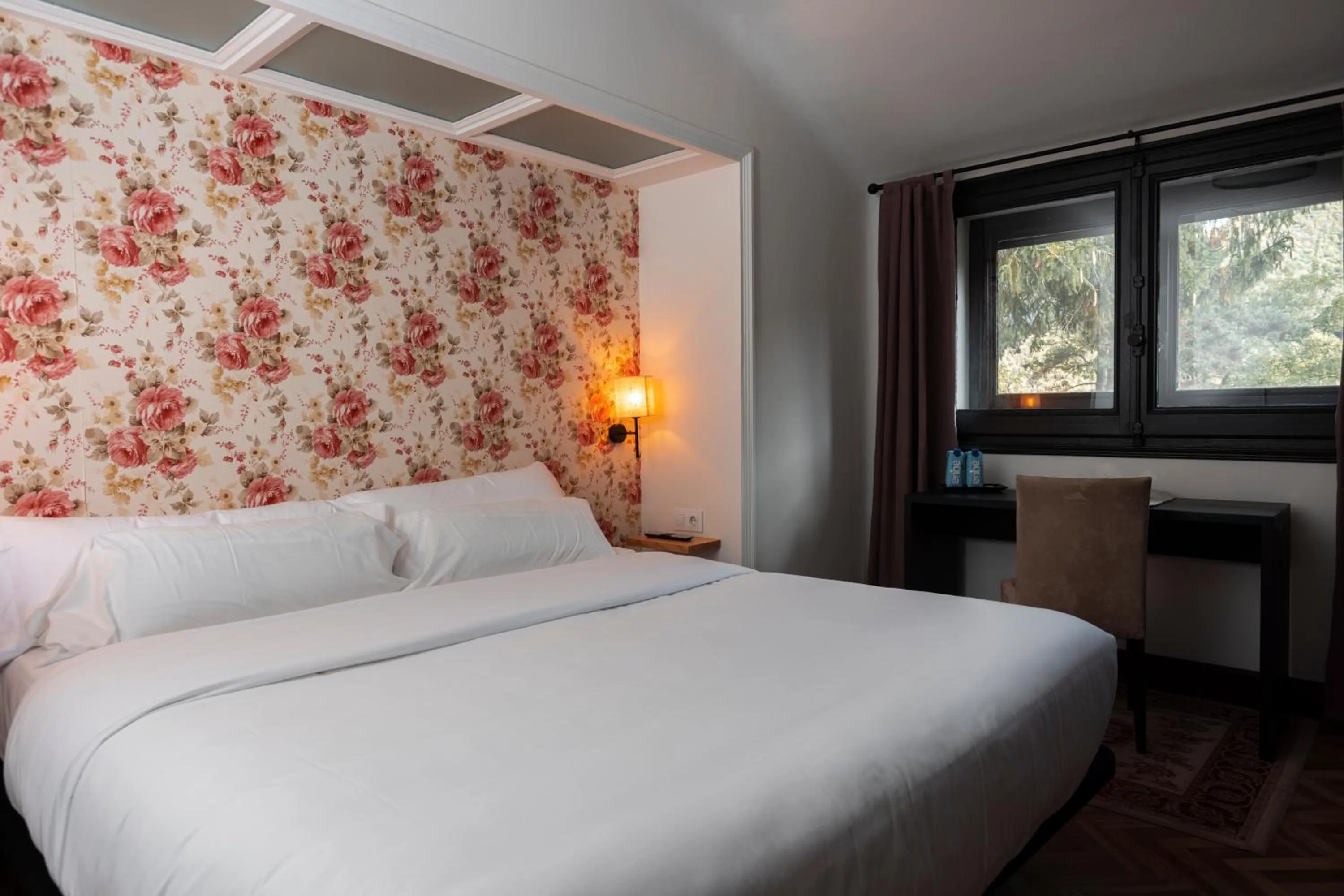 Property building, Bed in Angelats Hotel - A Signature Boutique Hotel