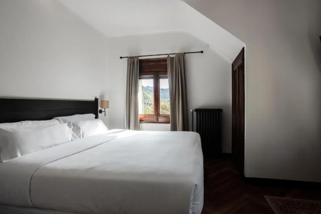 Bed in Angelats Hotel - A Signature Boutique Hotel
