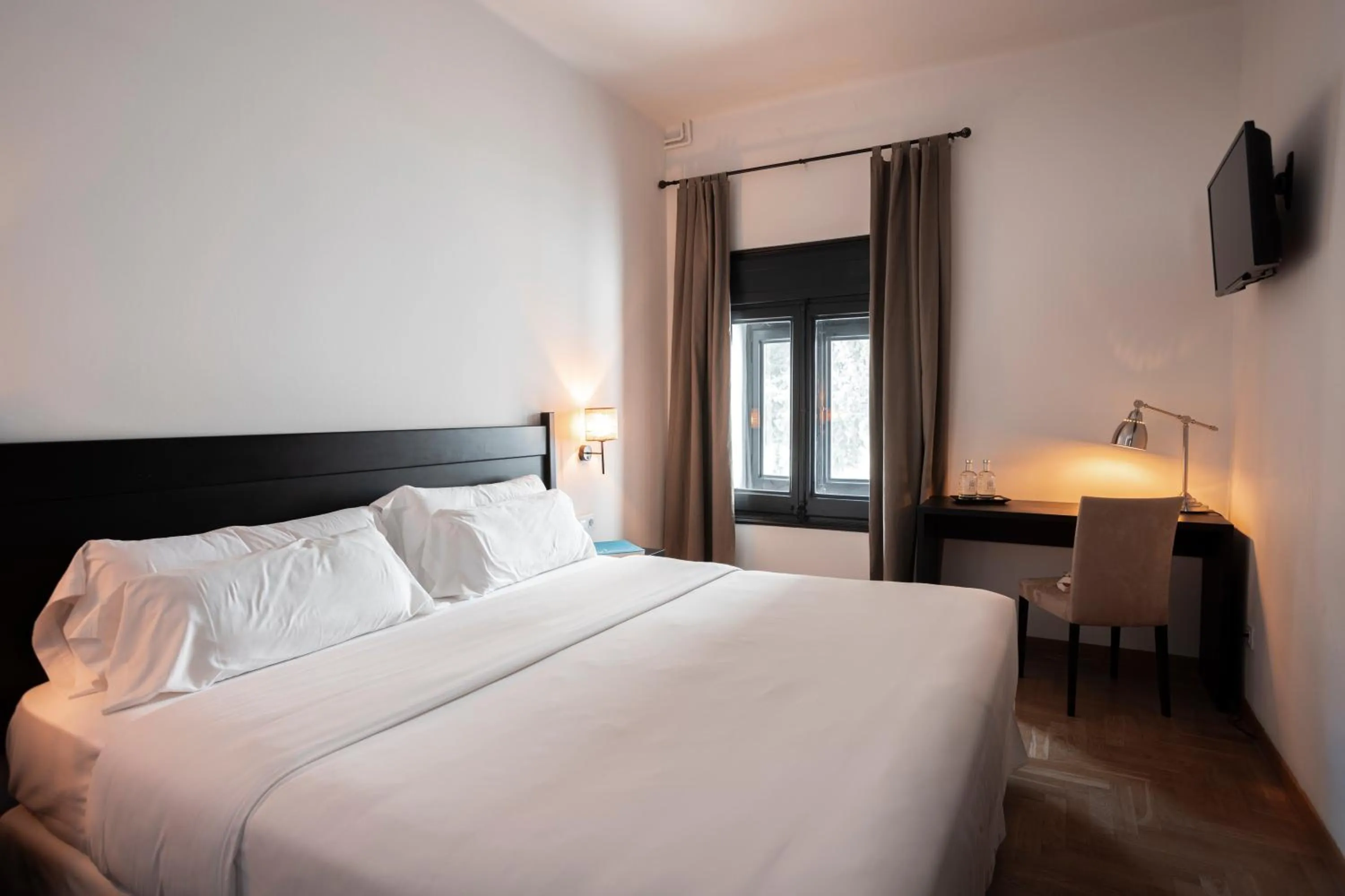 Property building, Bed in Angelats Hotel - A Signature Boutique Hotel