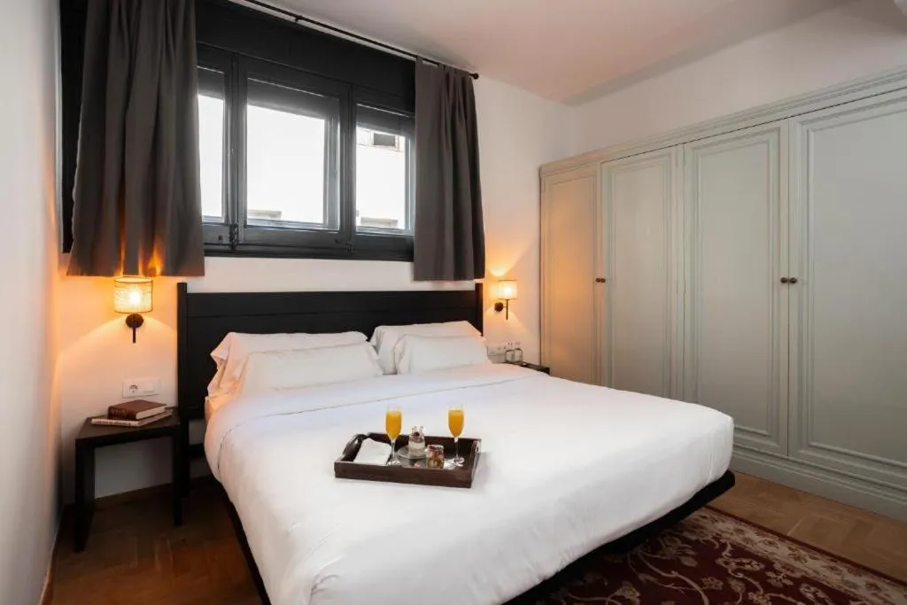Bed in Angelats Hotel - A Signature Boutique Hotel