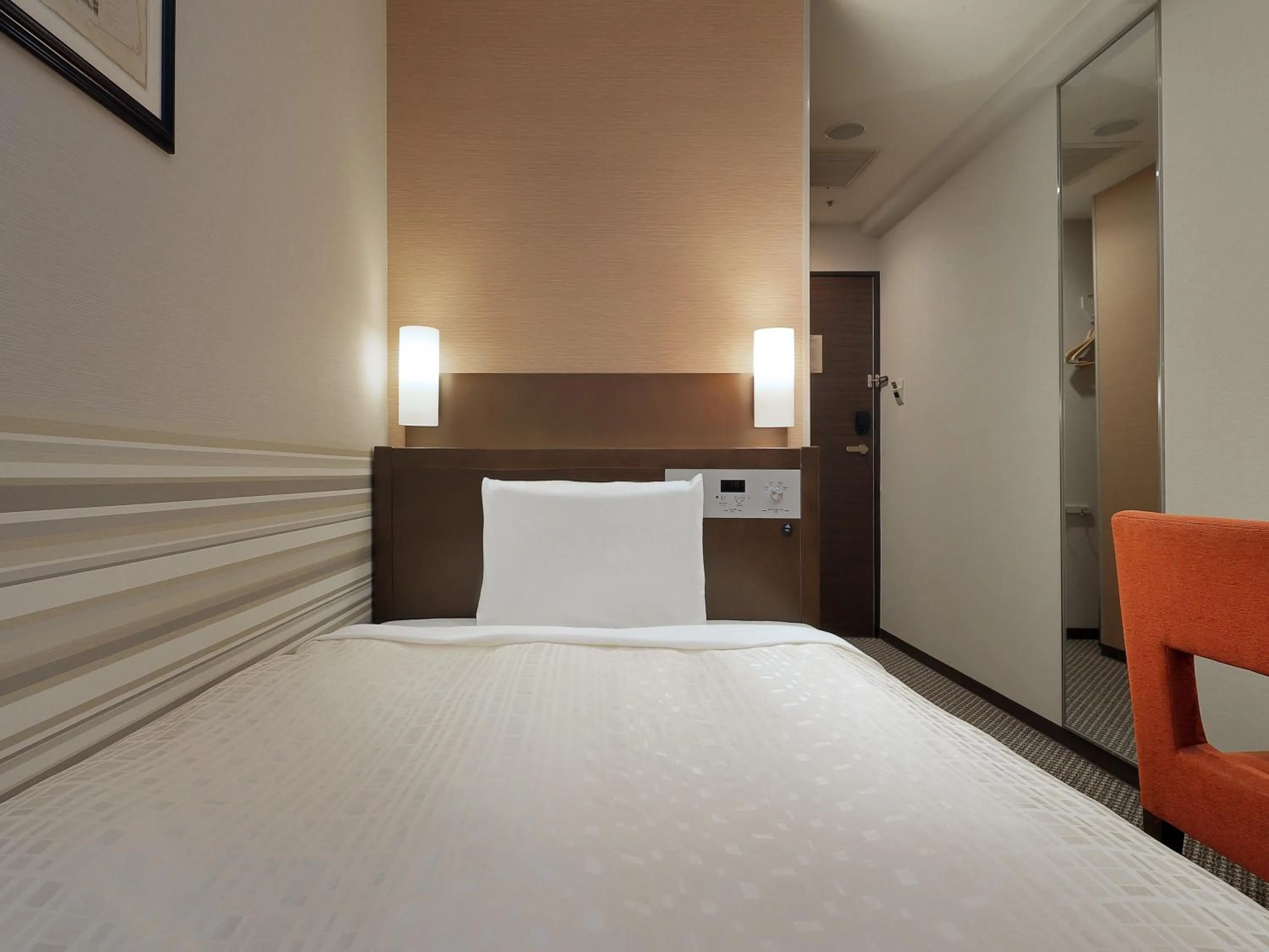 Bed in Keio Presso Inn Kanda