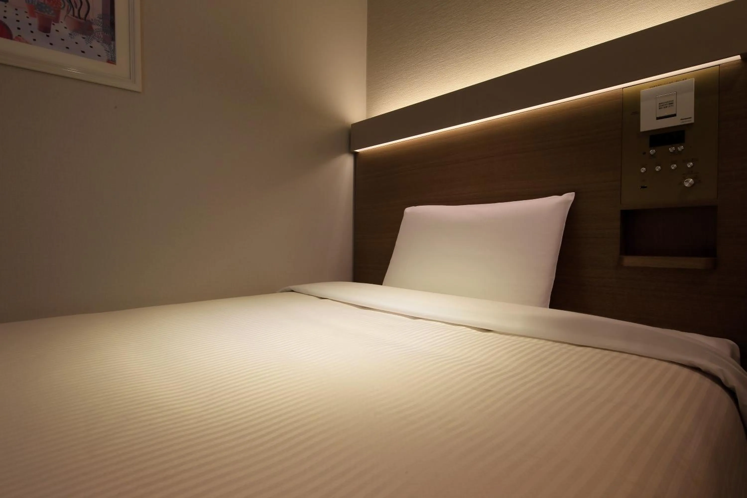 Bed in Keio Presso Inn Otemachi