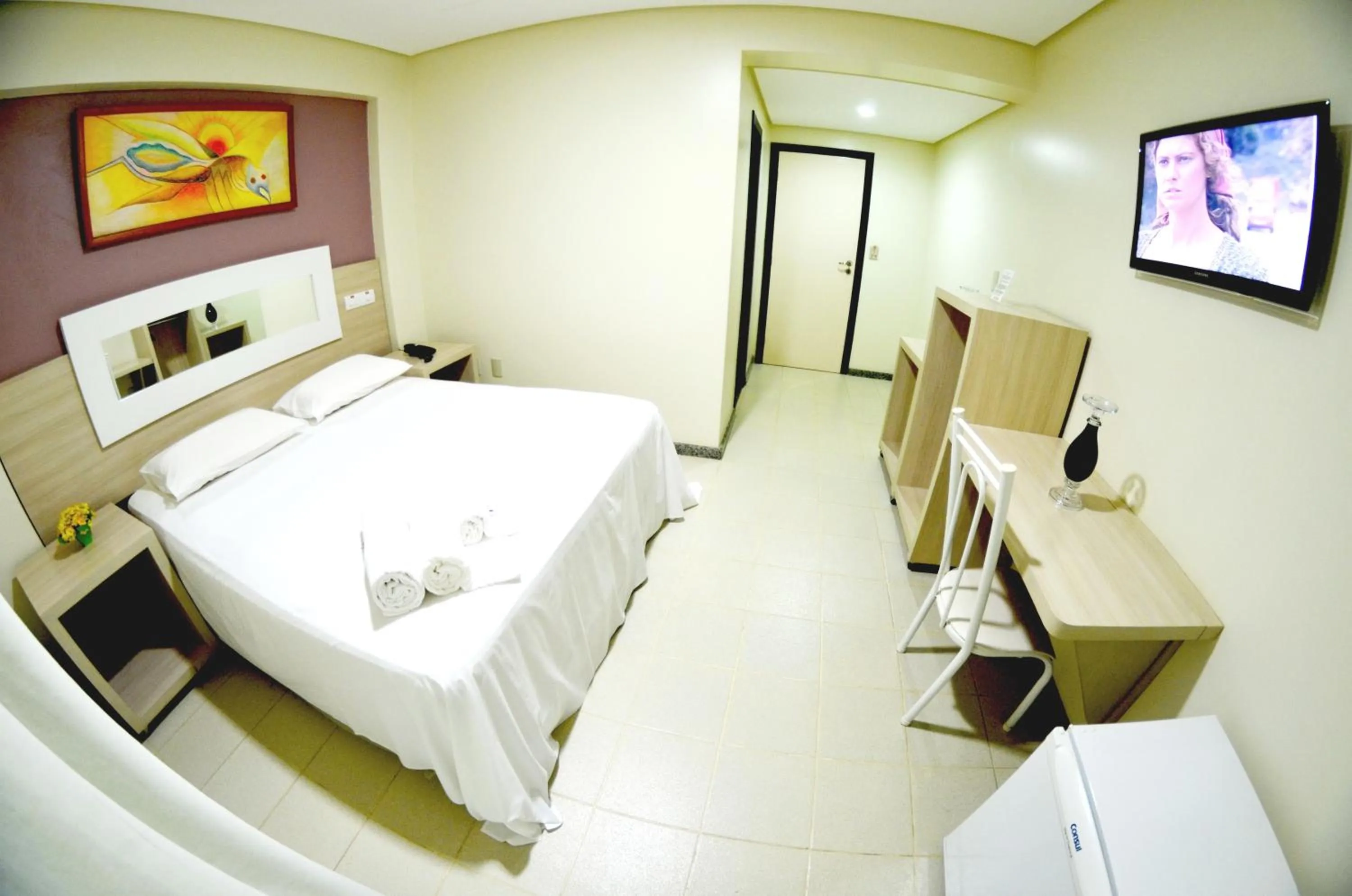 Bed in Hotel Oceania