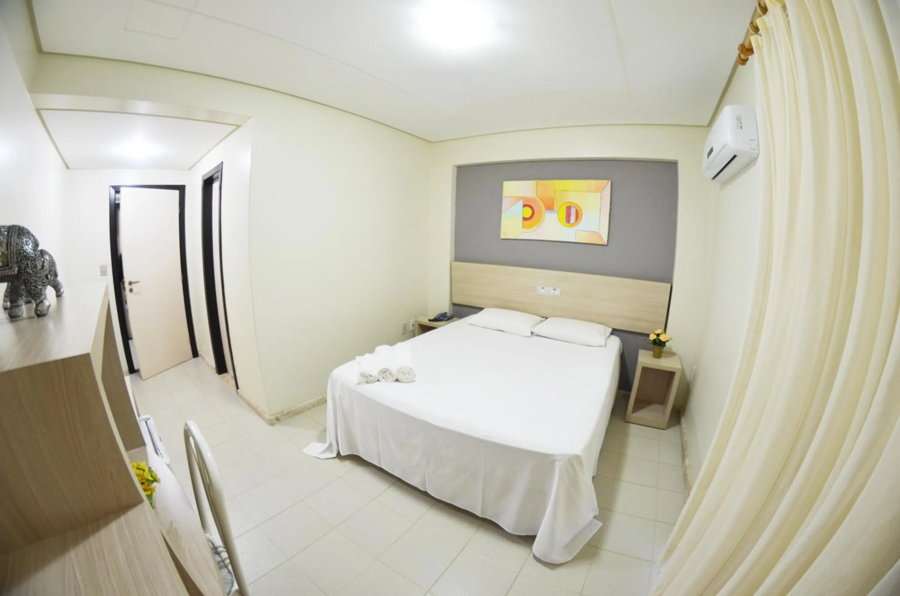 Bed in Hotel Oceania