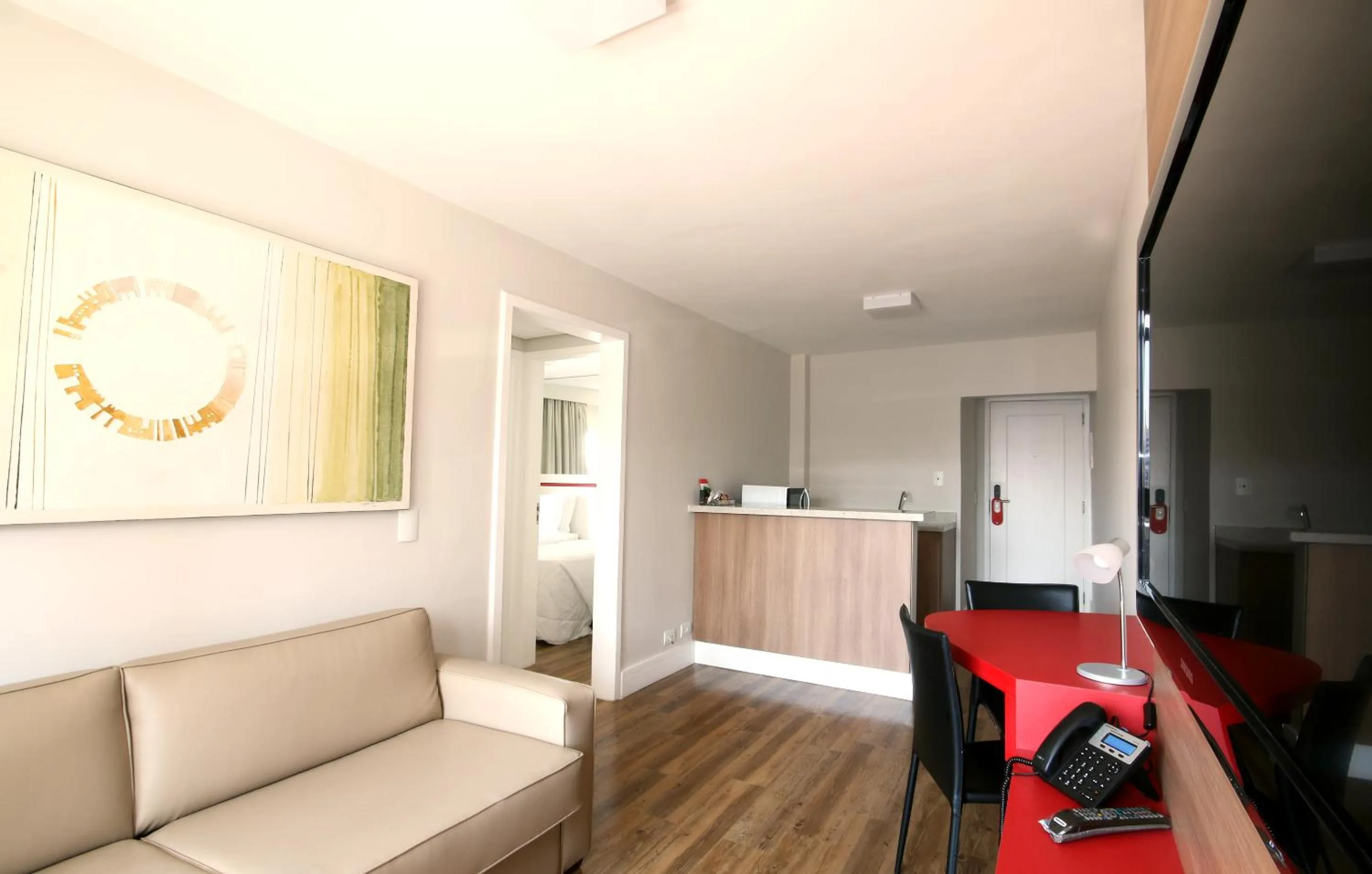 Communal lounge/ TV room in Ez Aclimação Hotel