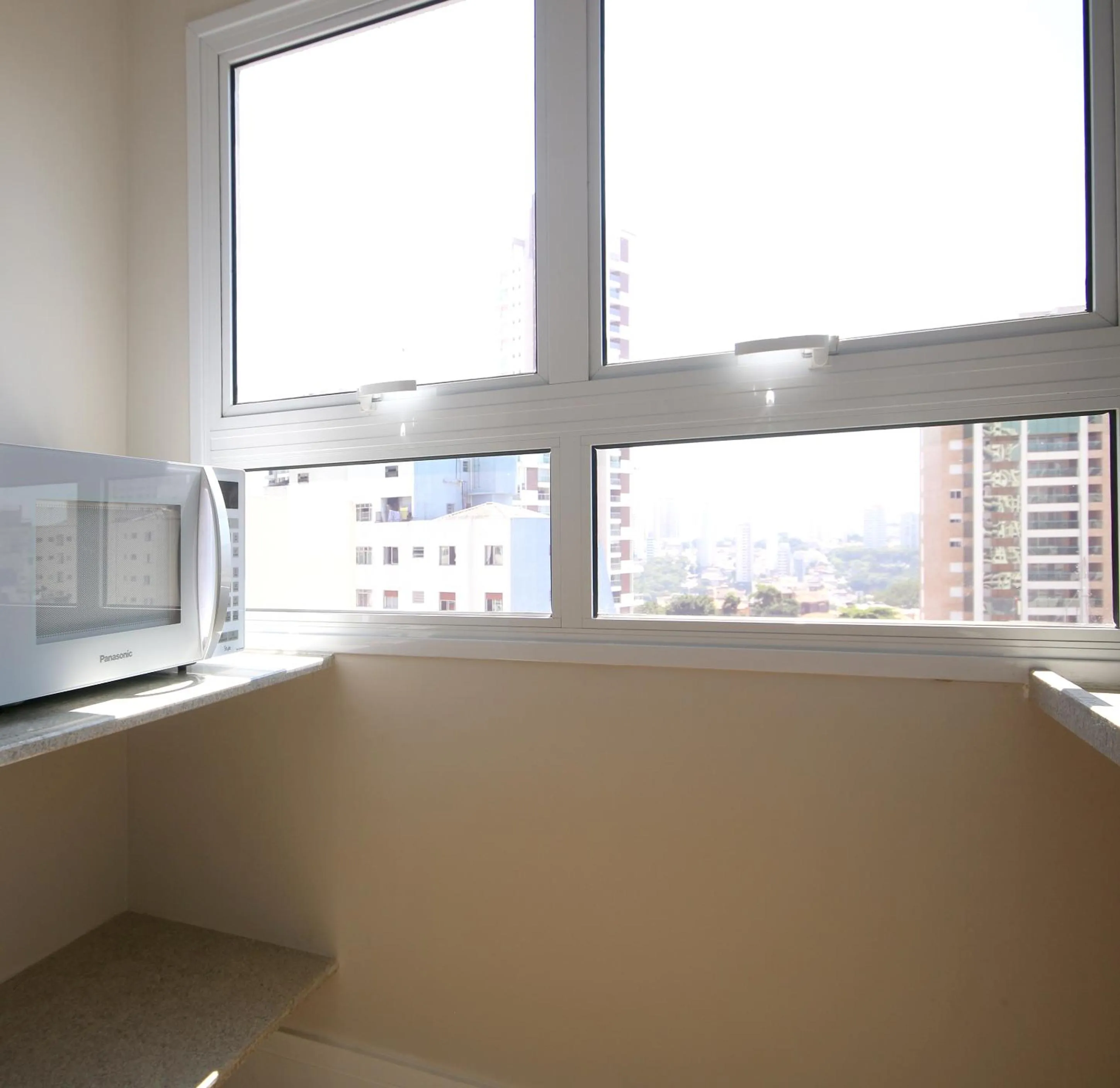 Photo of the whole room in Ez Aclimação Hotel