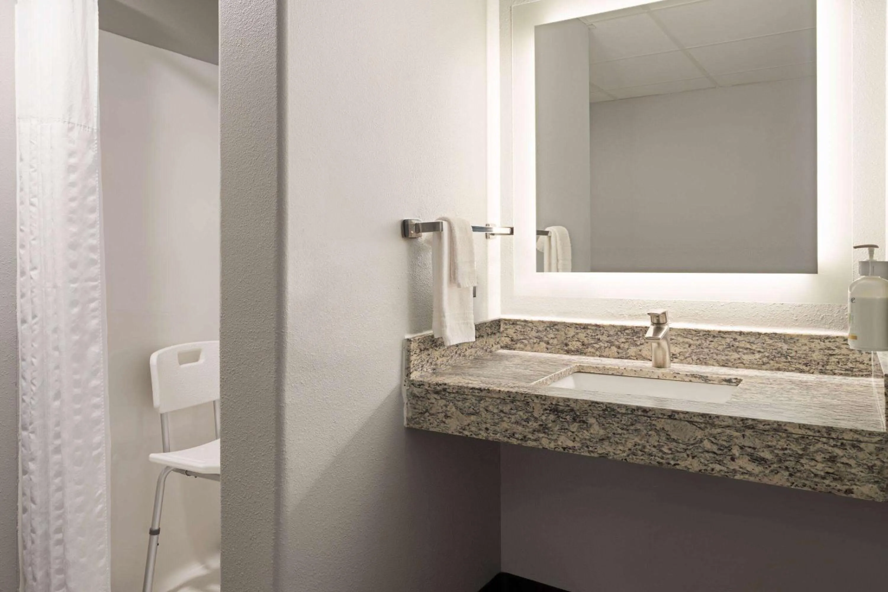 Shower in AmericInn by Wyndham Beaver Dam