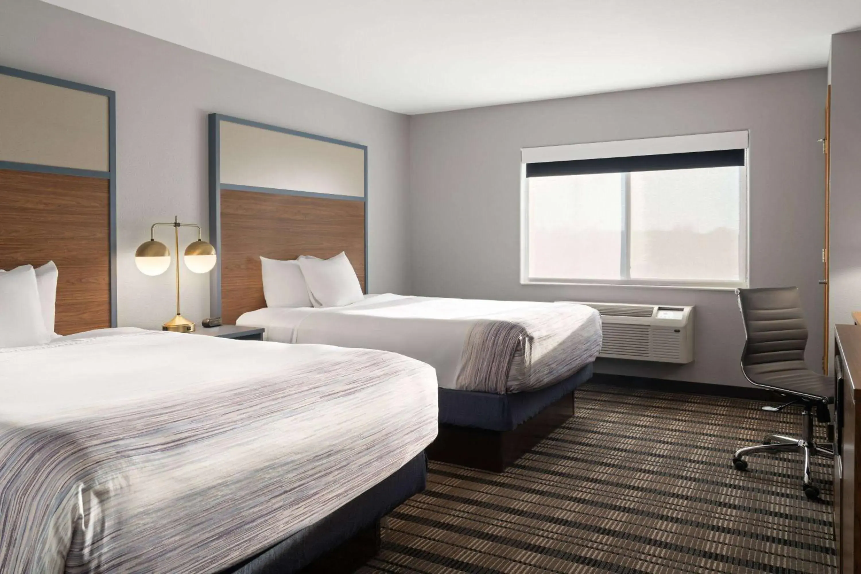 Queen Room with Two Queen Beds - Non-Smoking in AmericInn by Wyndham Beaver Dam Queen Room with Two Queen Beds - Non-Smoking in AmericInn by Wyndham Beaver Dam