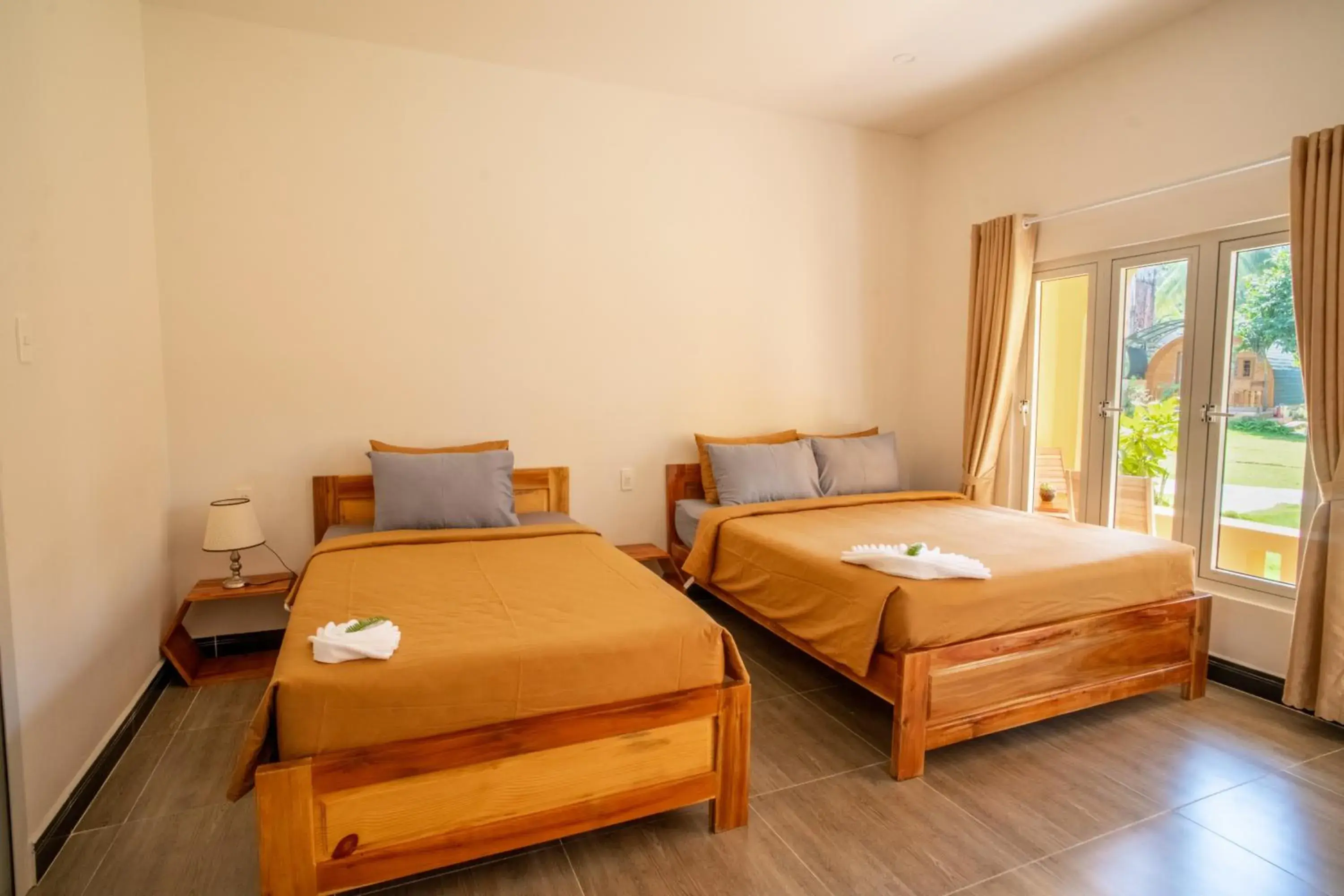 Triple Room with Garden View in Vida Loca Sunset Beach Resort Triple Room with Garden View in Vida Loca Sunset Beach Resort