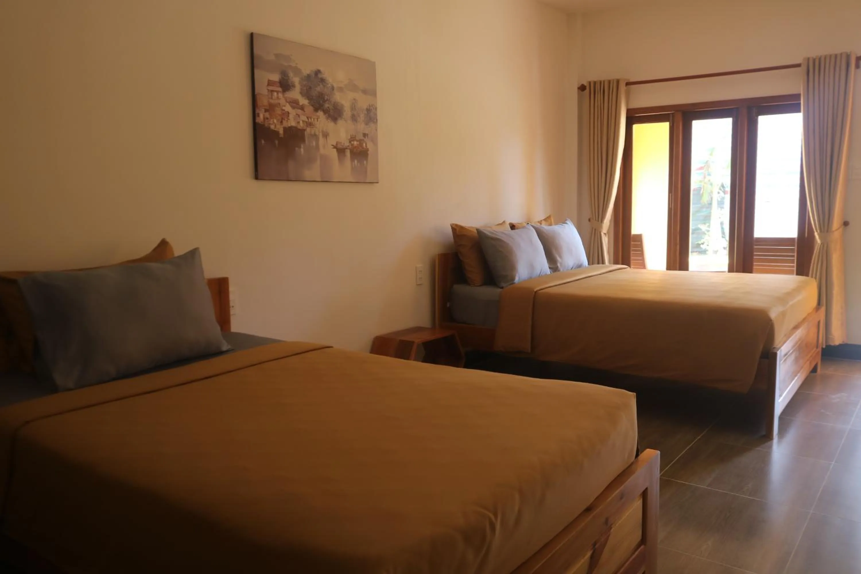 Bed in Vida Loca Sunset Beach Resort