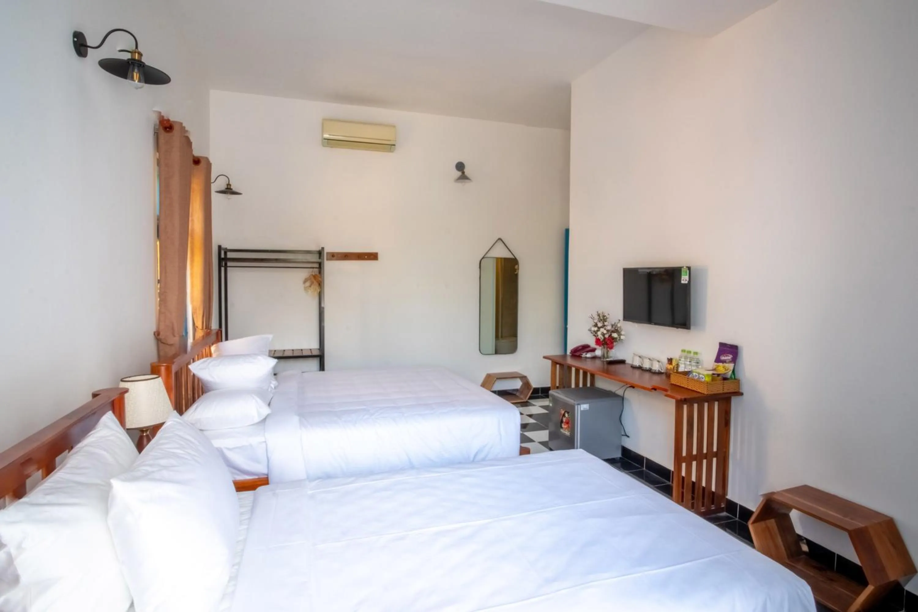 Bed in Vida Loca Sunset Beach Resort