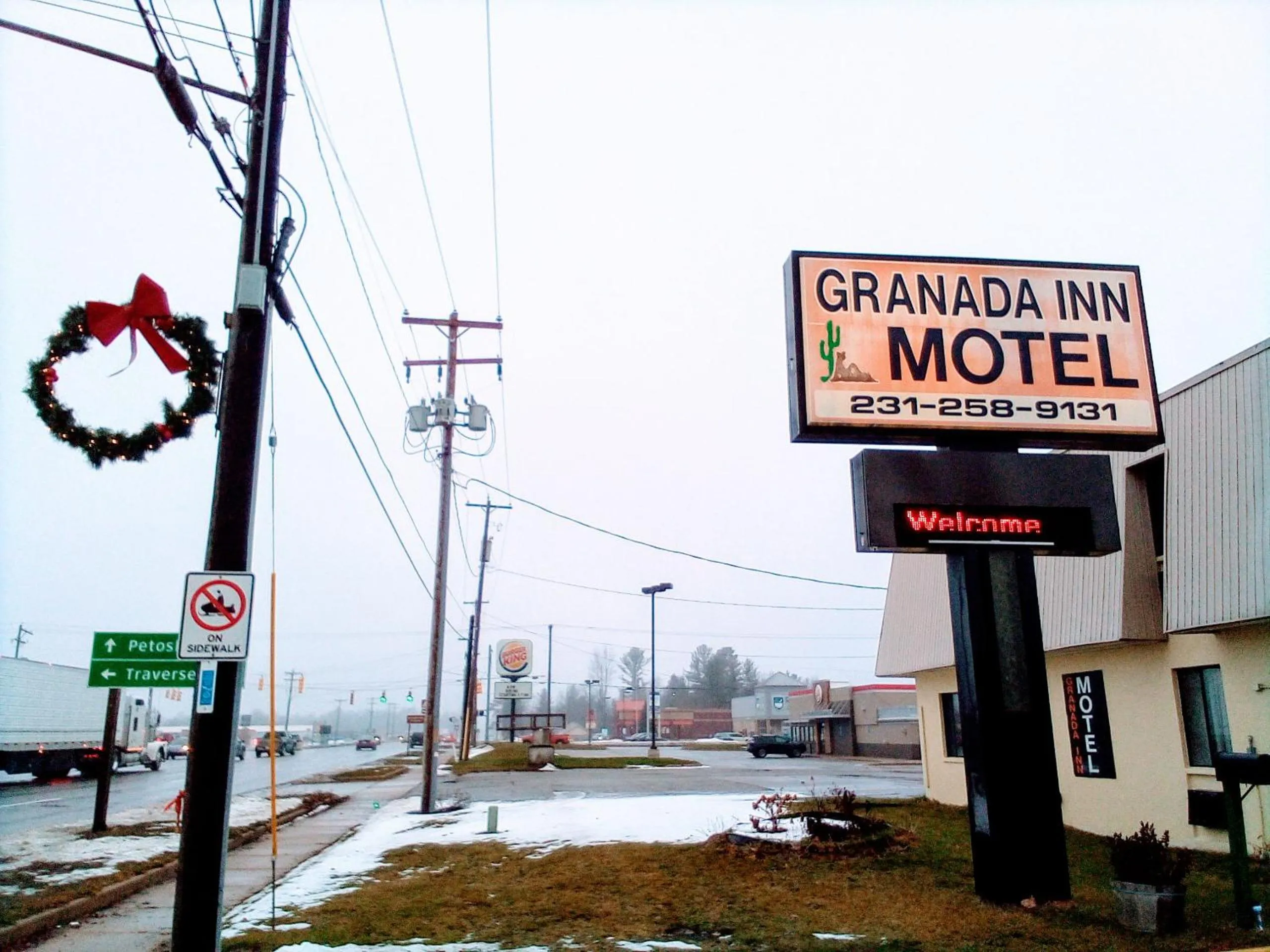 Property logo or sign in Granada Inn Motel - Kalkaska