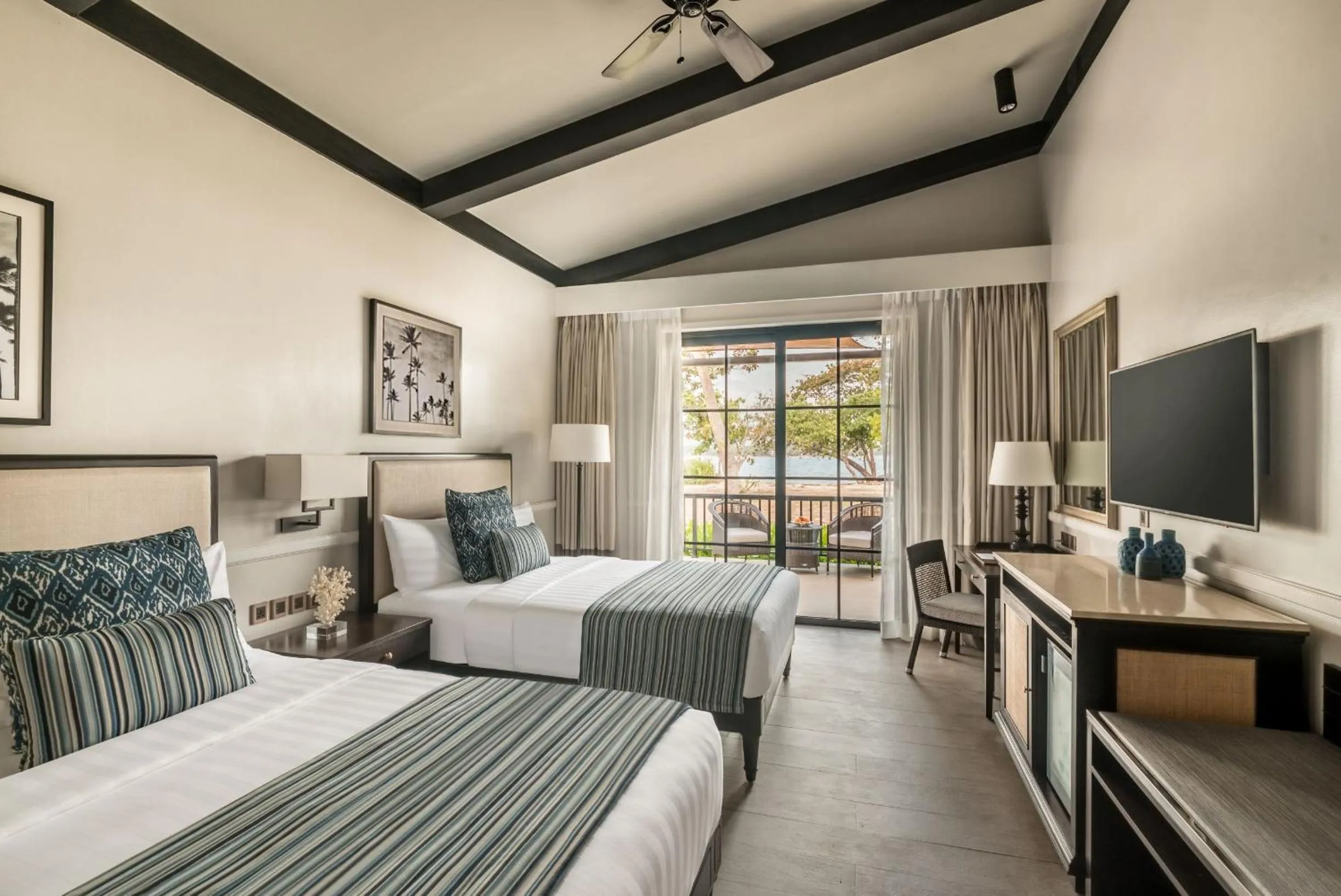 Bed in Dusit Thani Lubi Plantation Resort