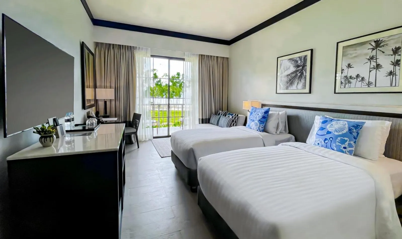 Bed in Dusit Thani Lubi Plantation Resort