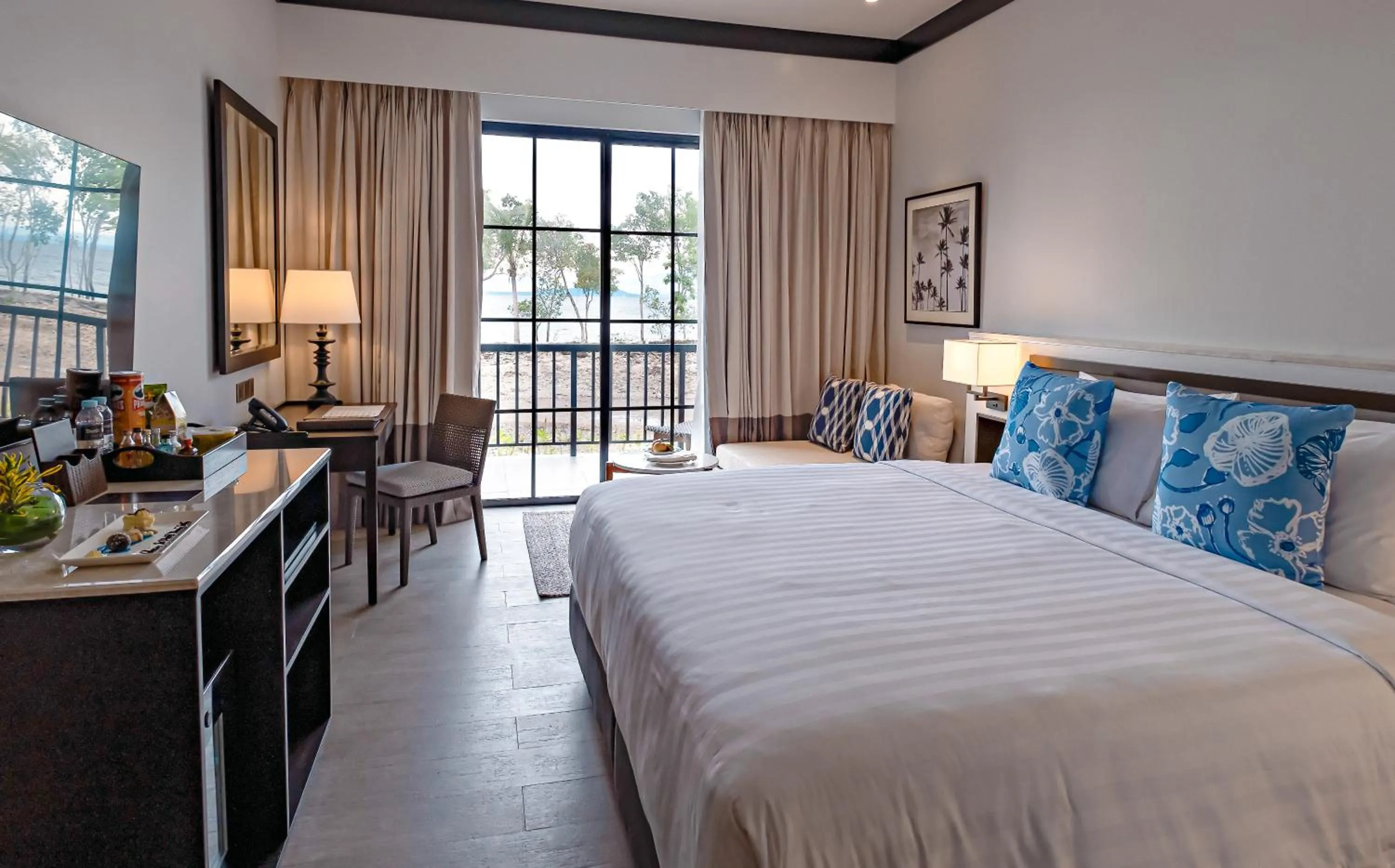 Bed in Dusit Thani Lubi Plantation Resort