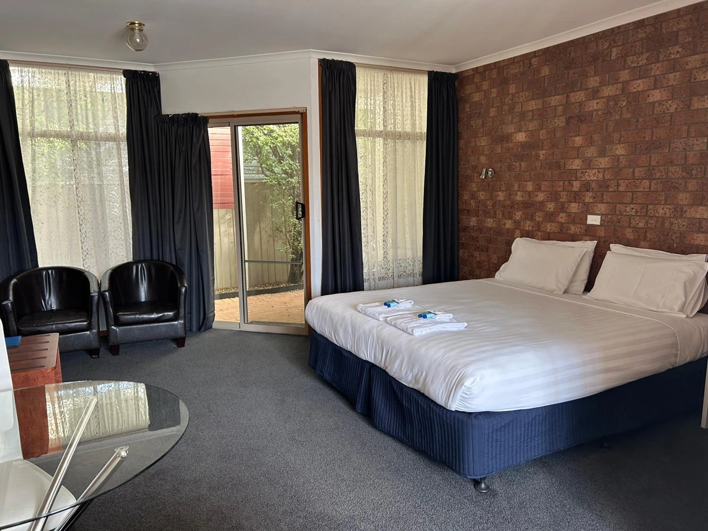 Bed in Portarlington Beach Motel