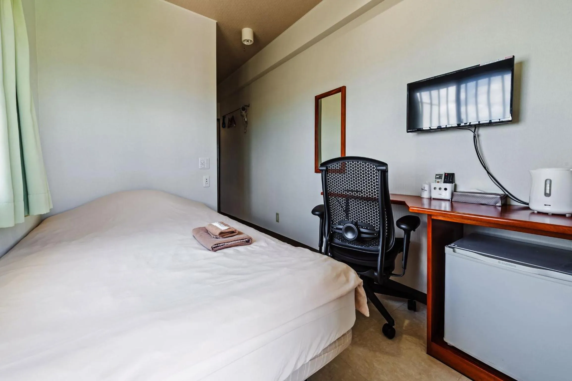 Bed in Hotel Sunset American