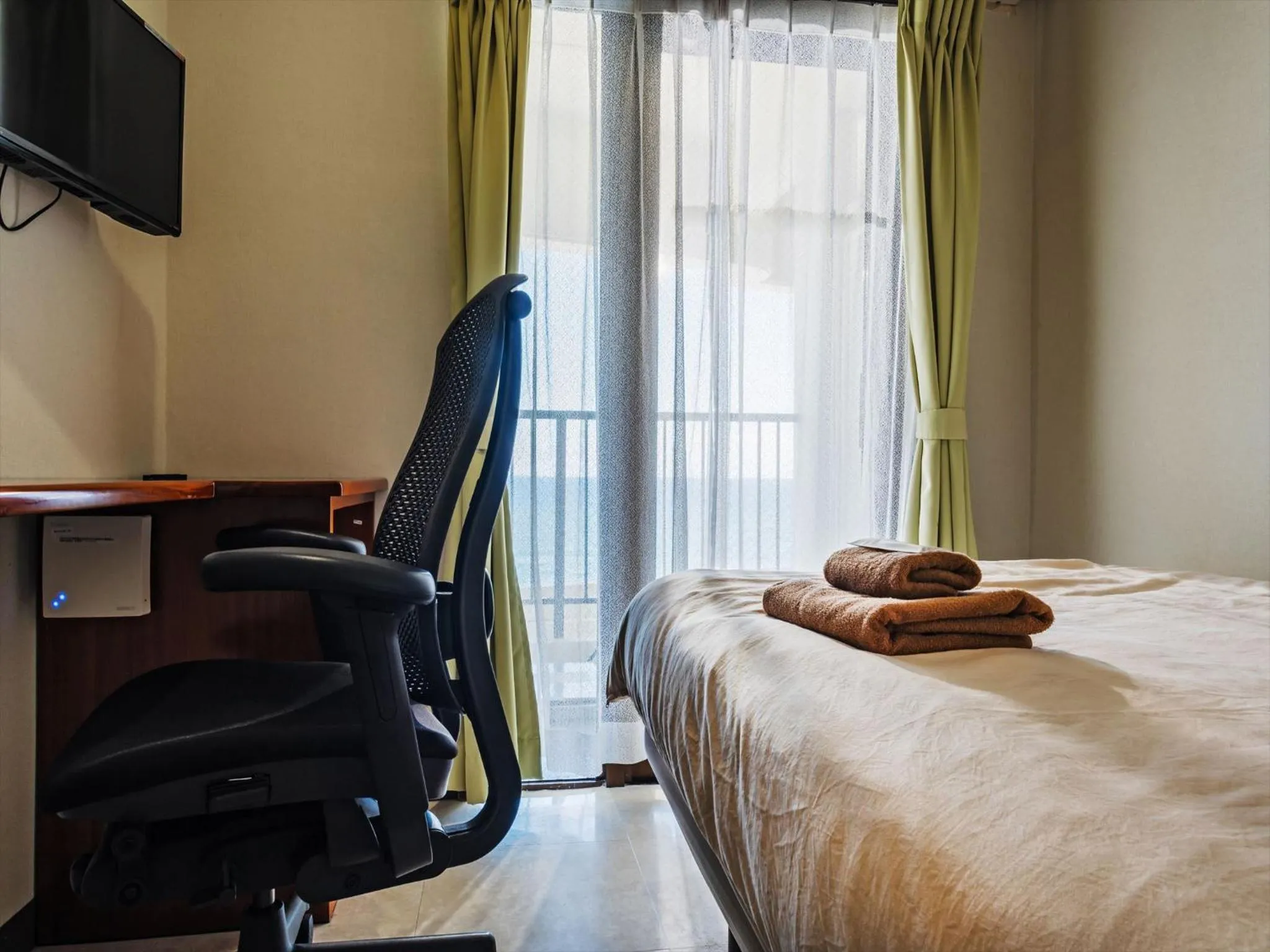 Bed in Hotel Sunset American