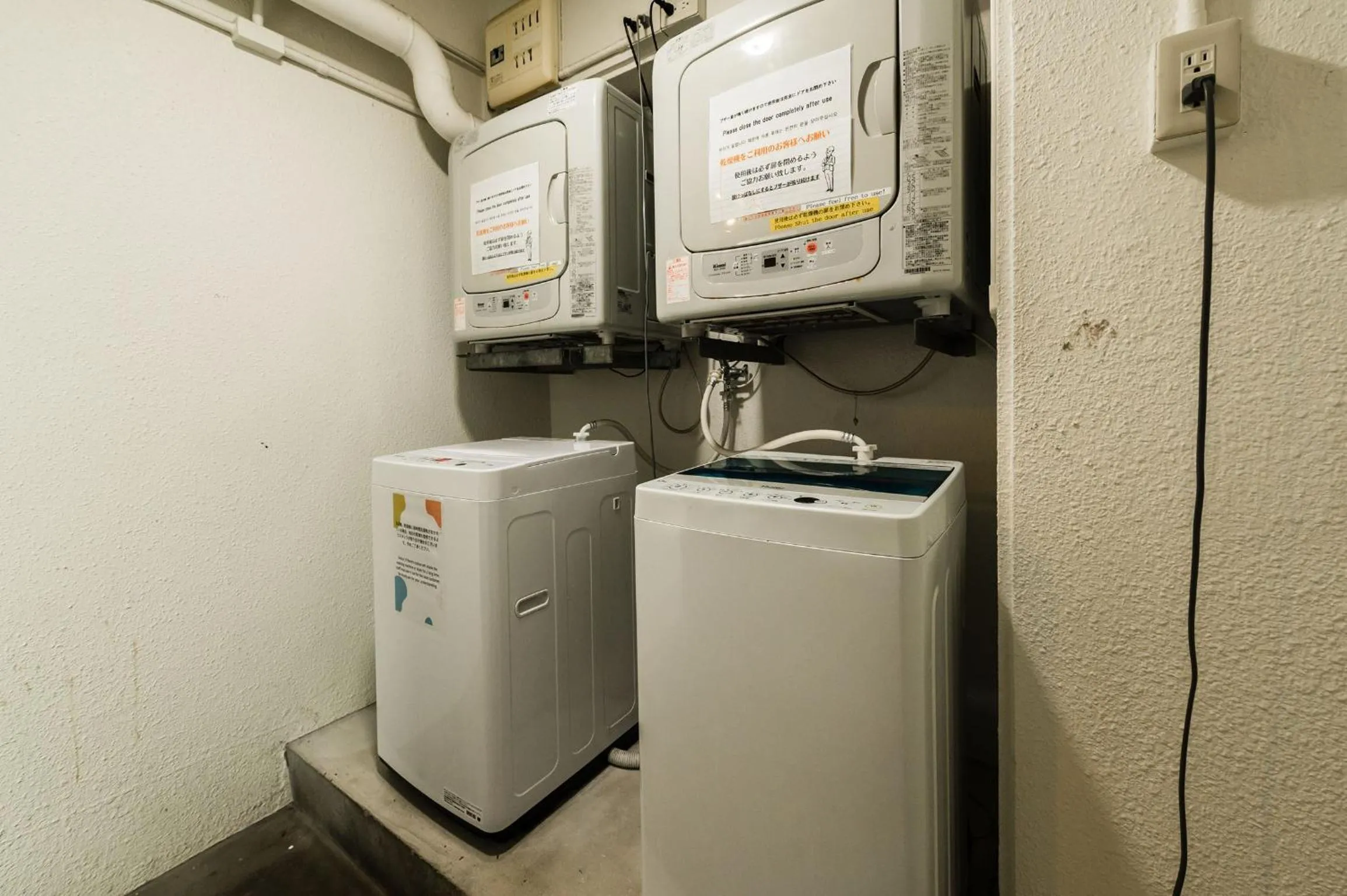 washing machine in Hotel Sunset American