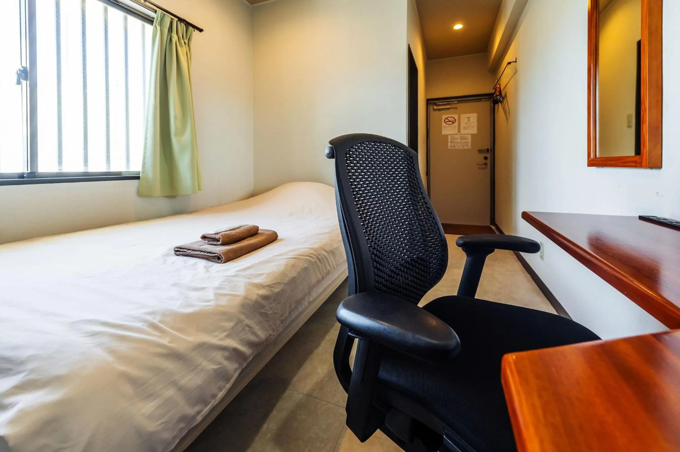 Bed in Hotel Sunset American