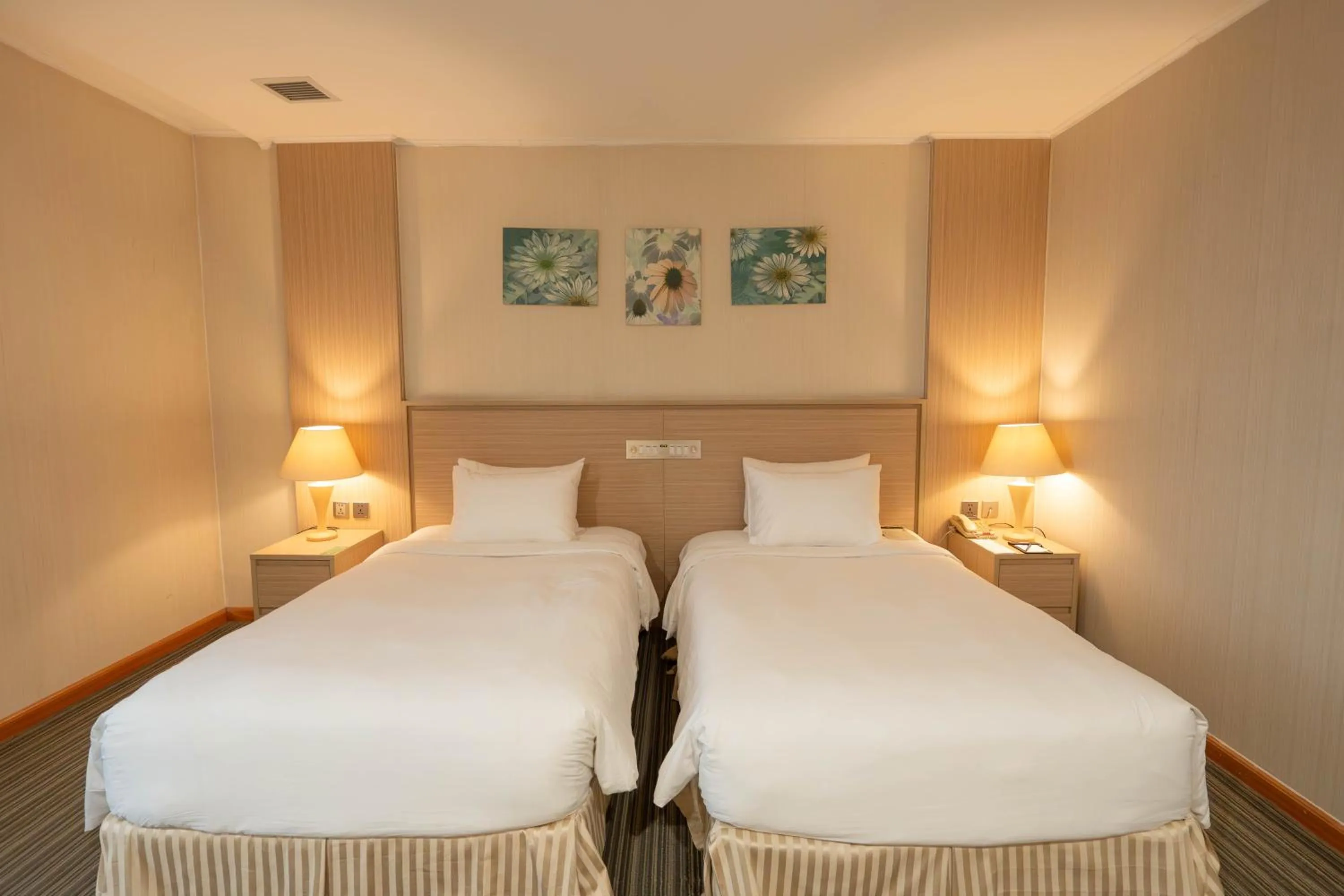 Bed in Super Candle Hotel