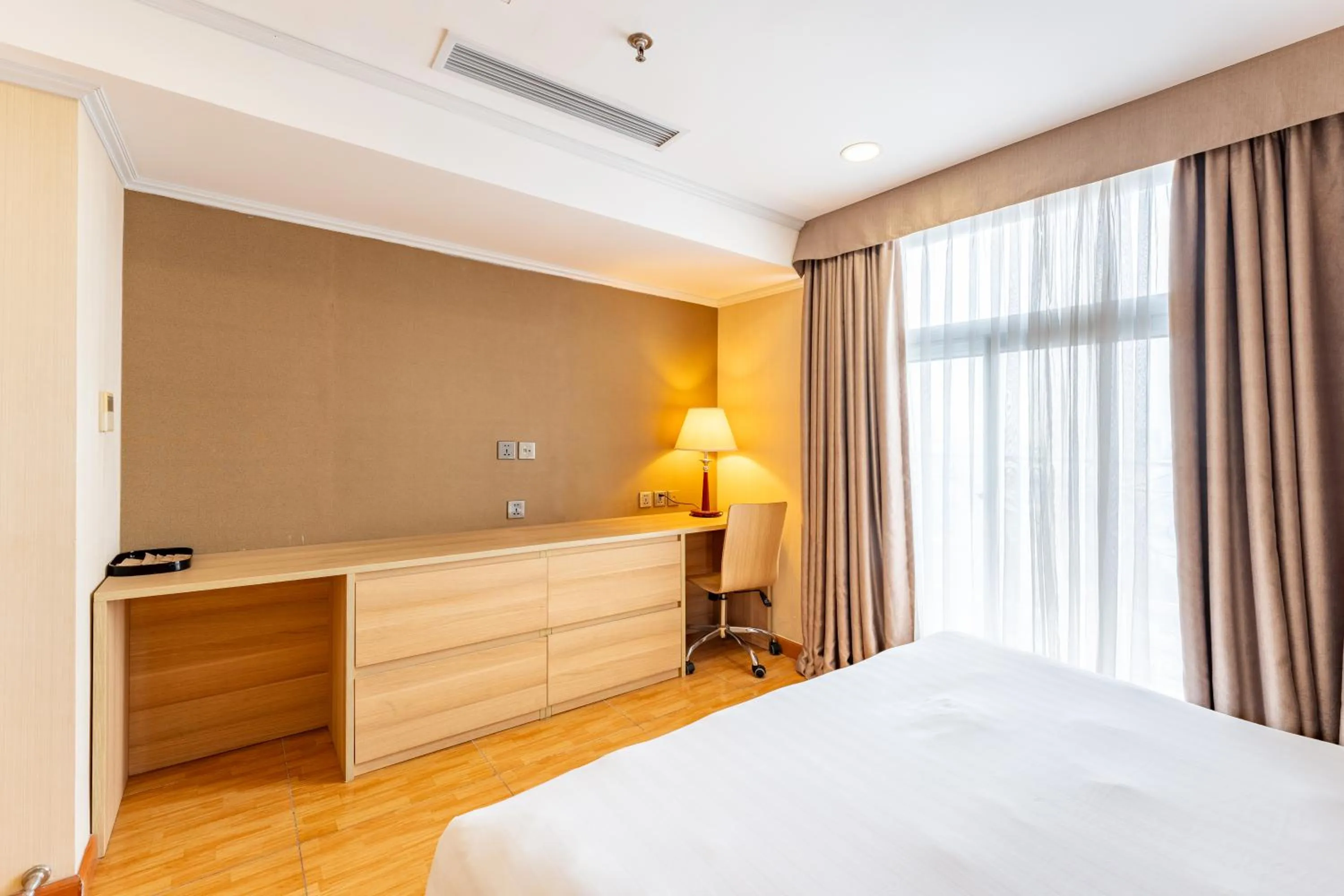 Bed in Super Candle Hotel