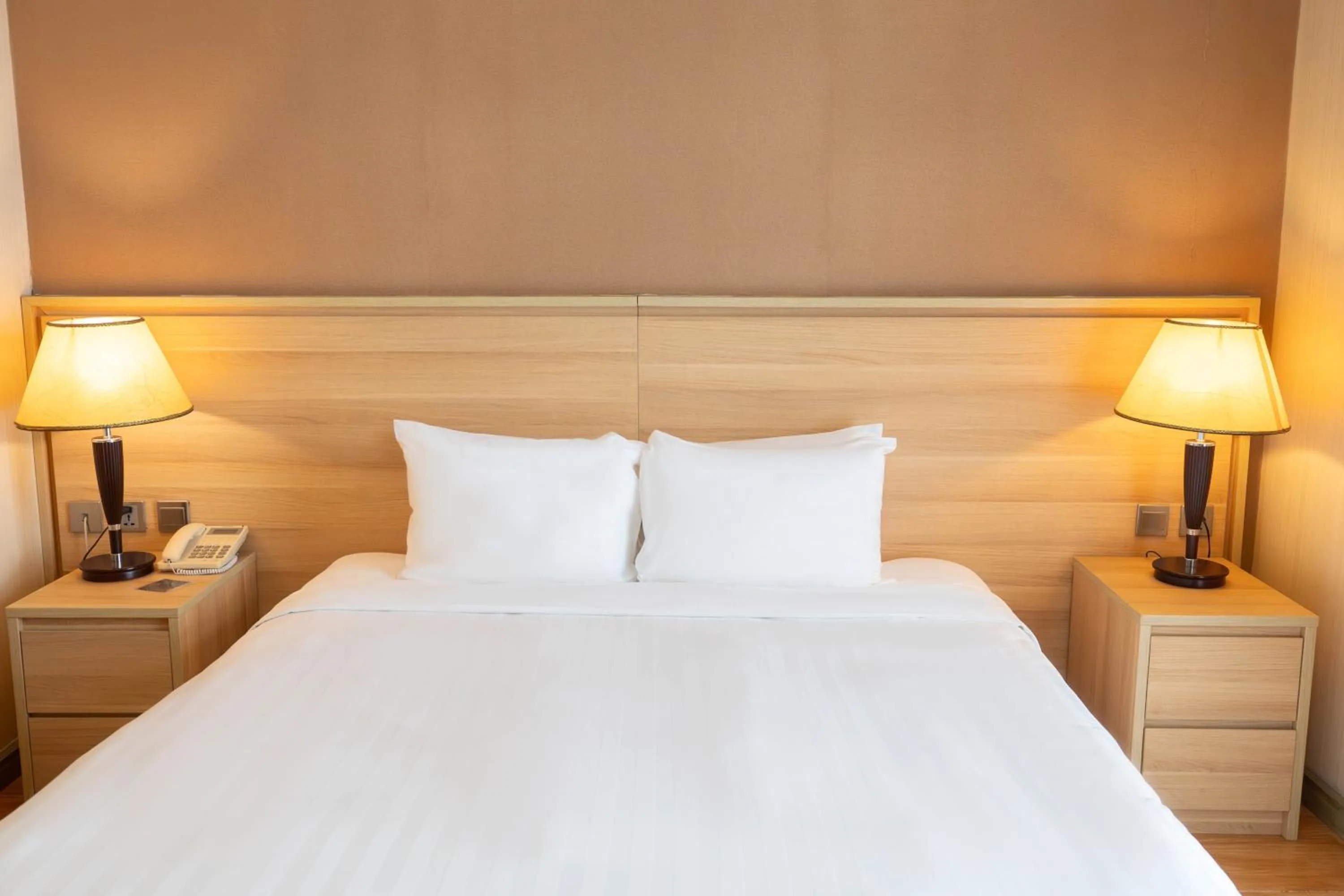 Bed in Super Candle Hotel