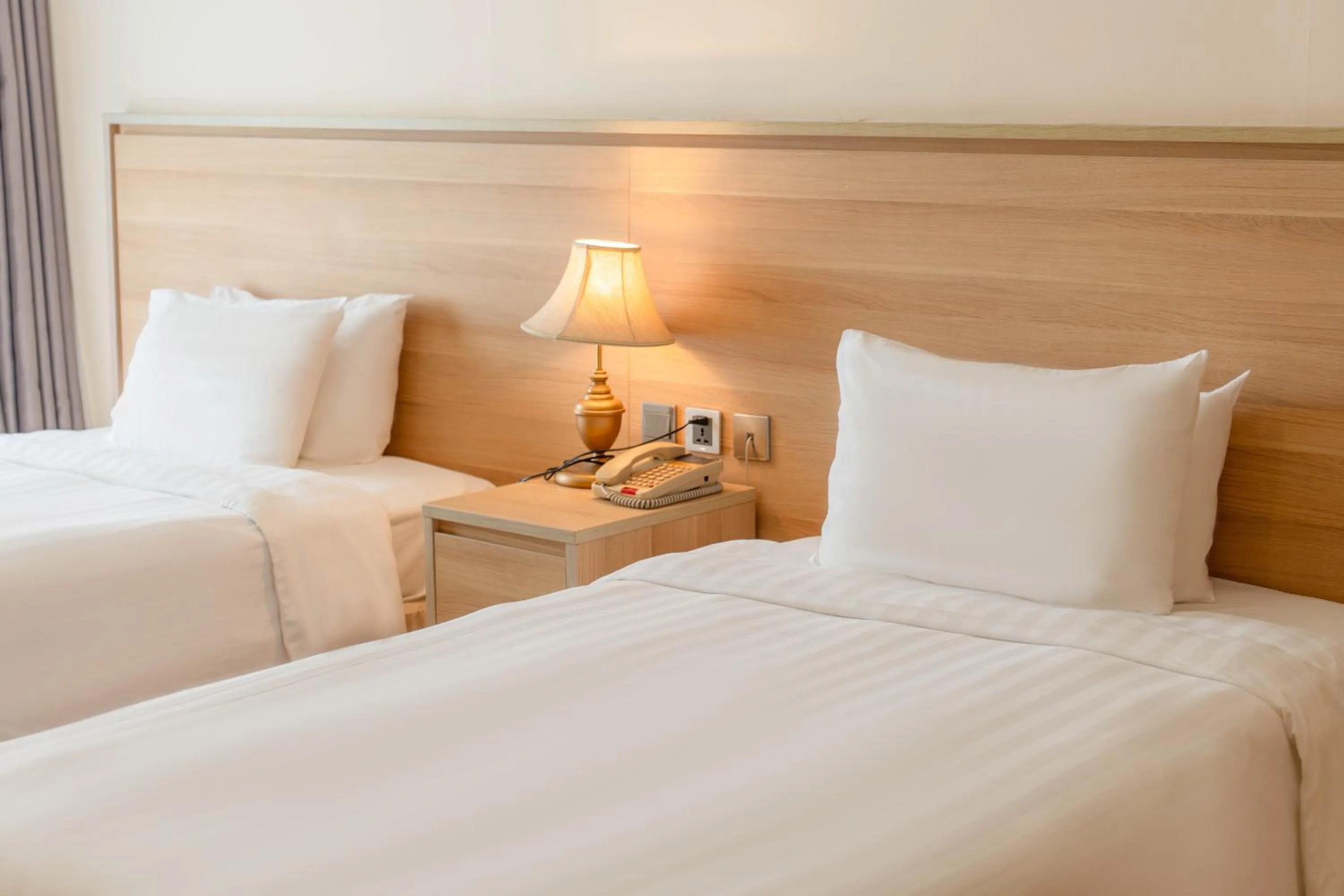 Bed in Super Candle Hotel