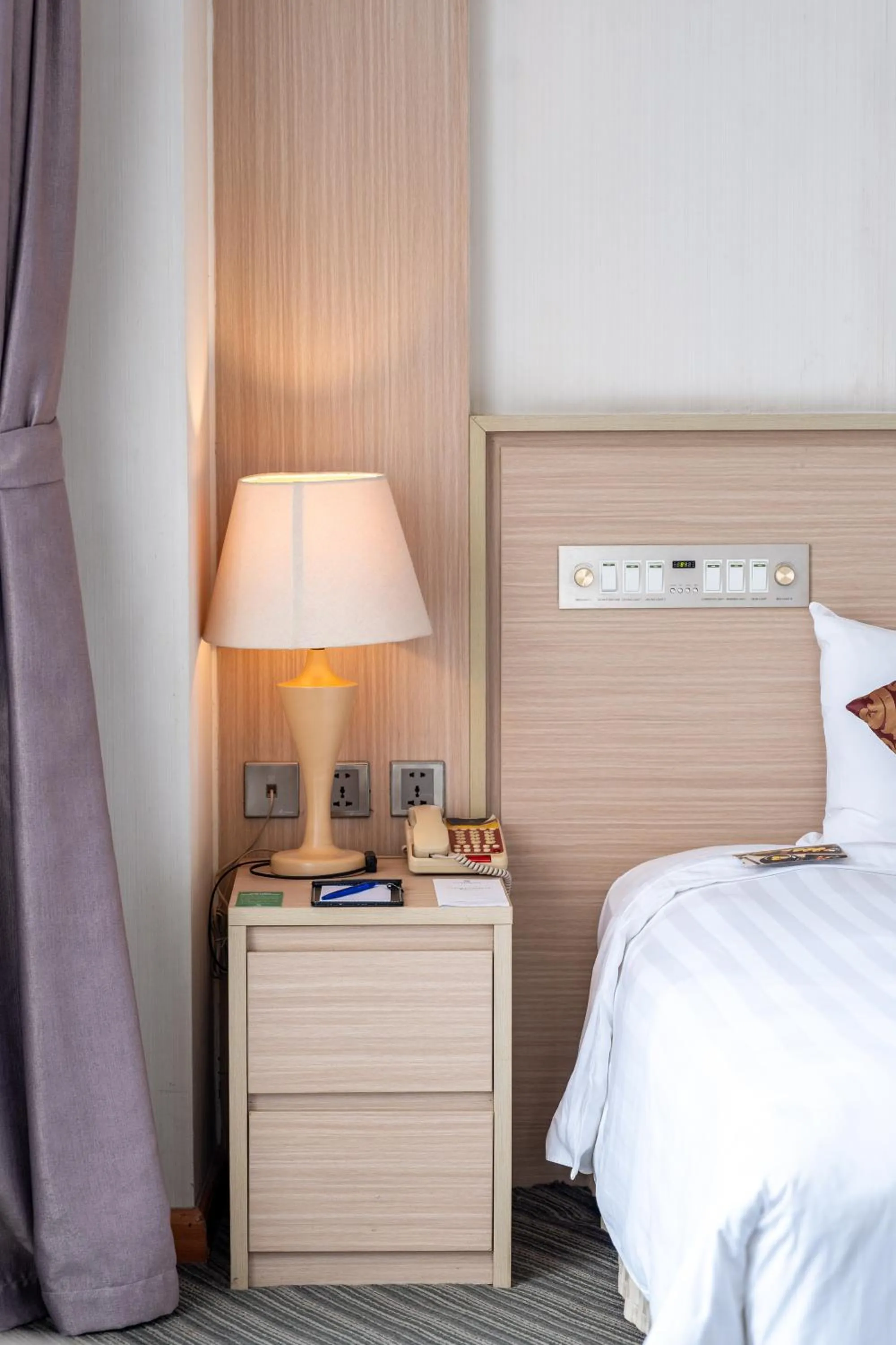 Bed in Super Candle Hotel