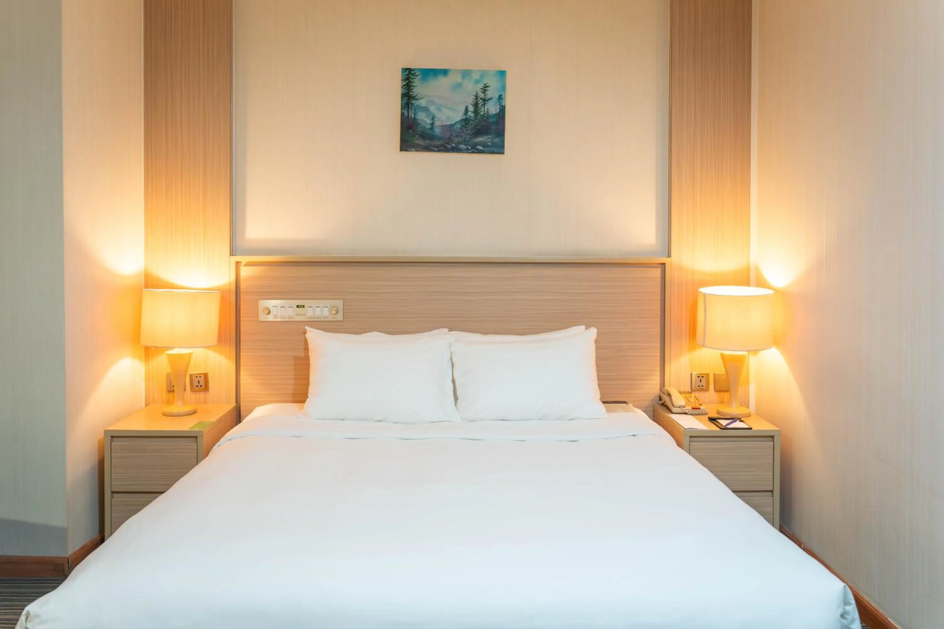 Bed in Super Candle Hotel