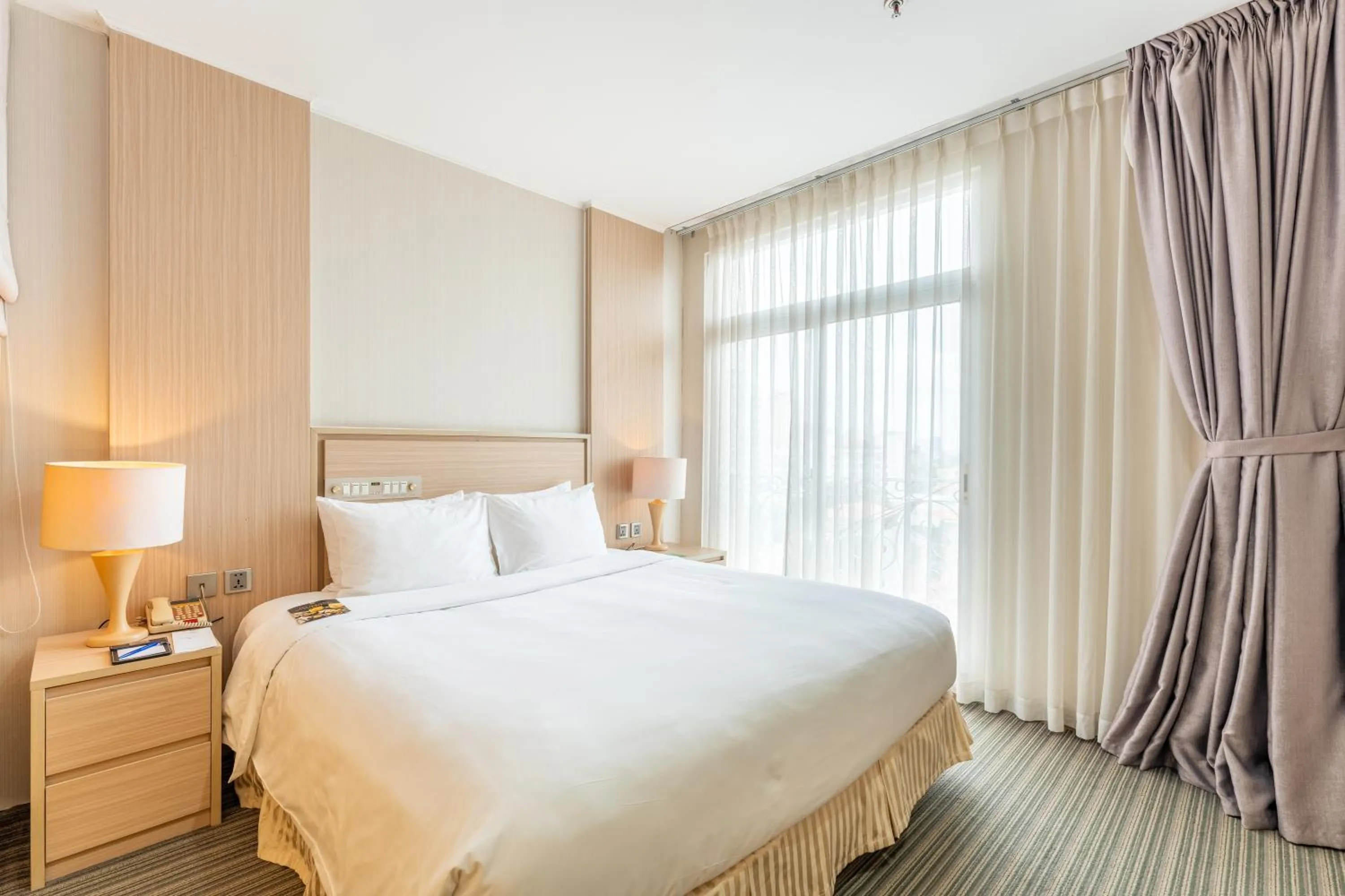 Bed in Super Candle Hotel