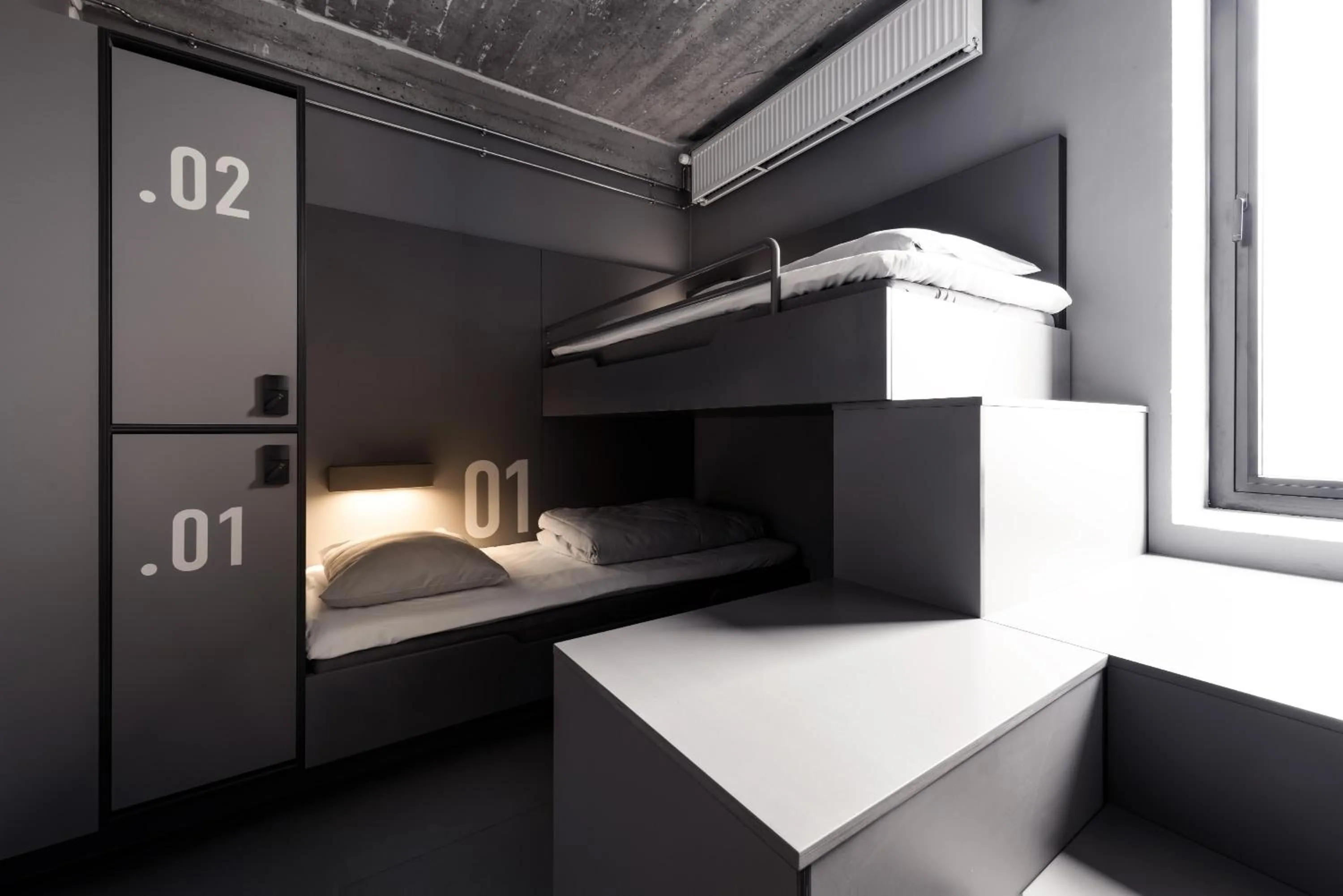 Bed in BOOK1 by Brøchner Hotels