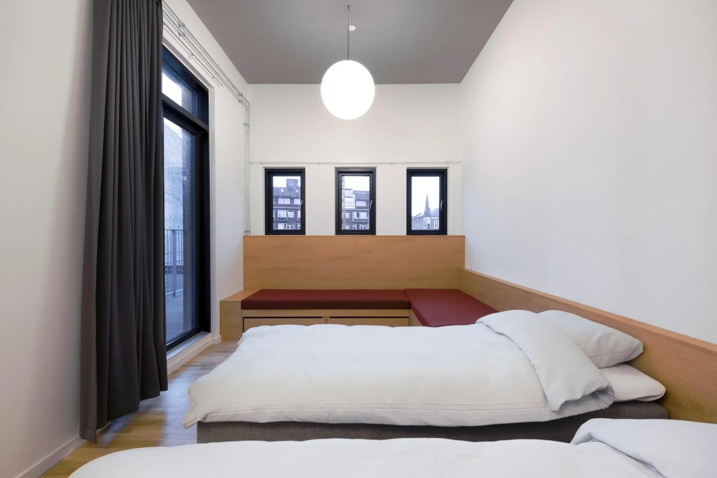 Bed in BOOK1 by Brøchner Hotels