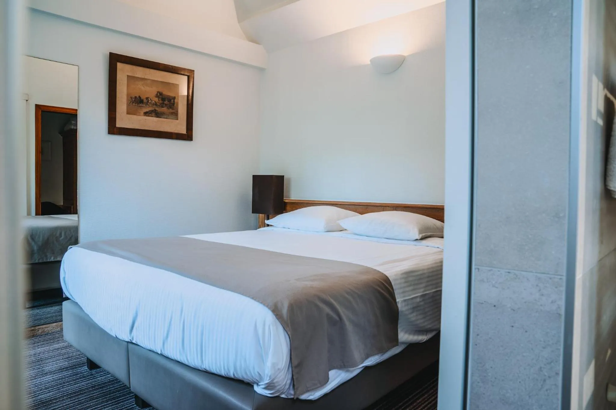 Bed in Hotel Les Eleveurs