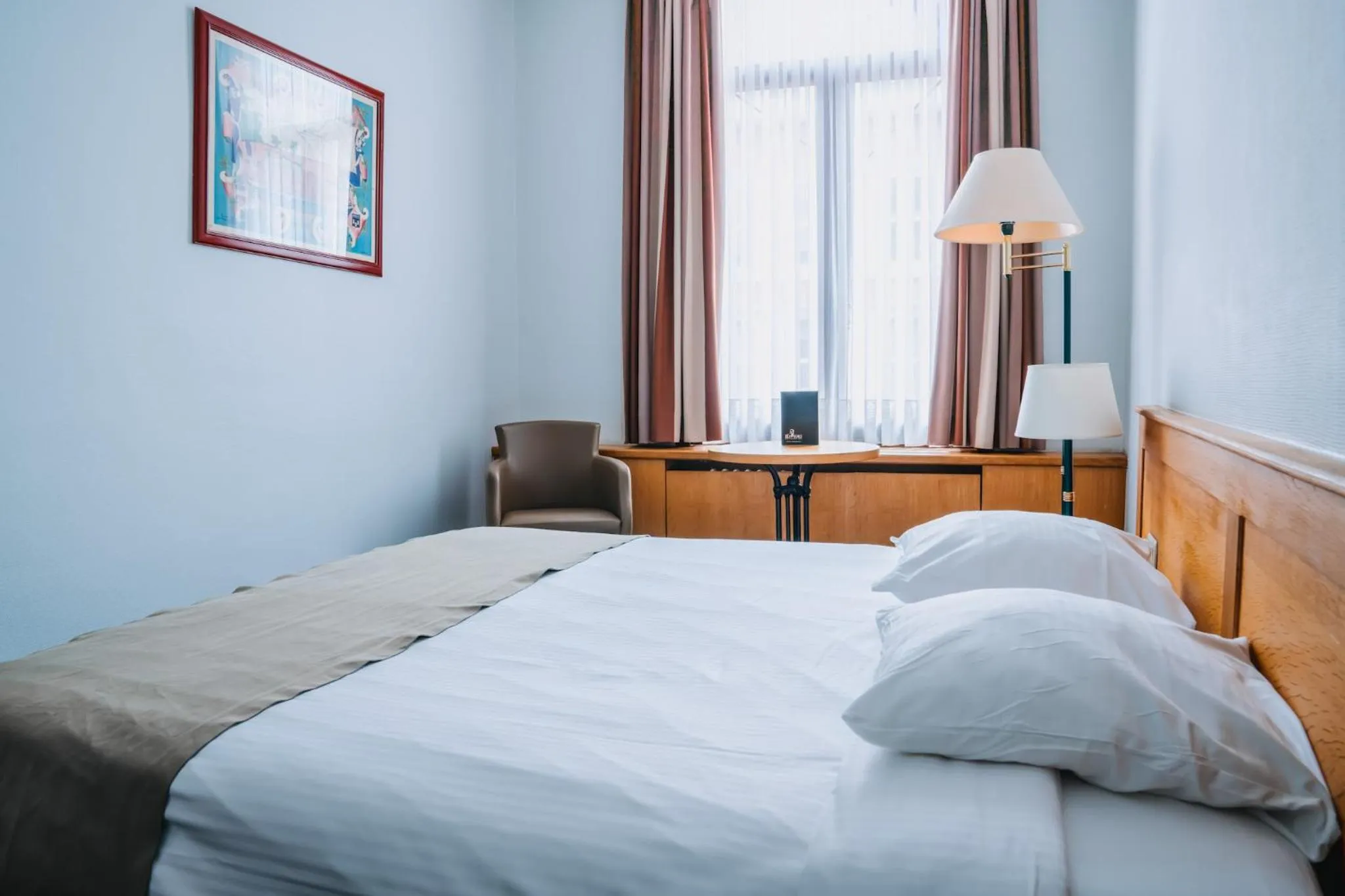 Bed in Hotel Les Eleveurs