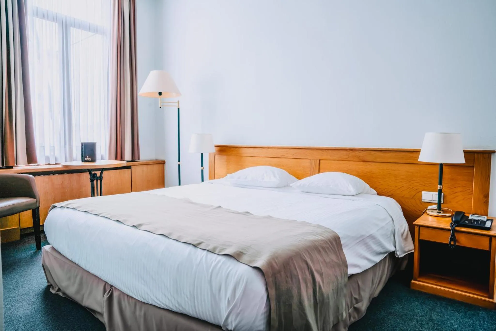 Bed in Hotel Les Eleveurs