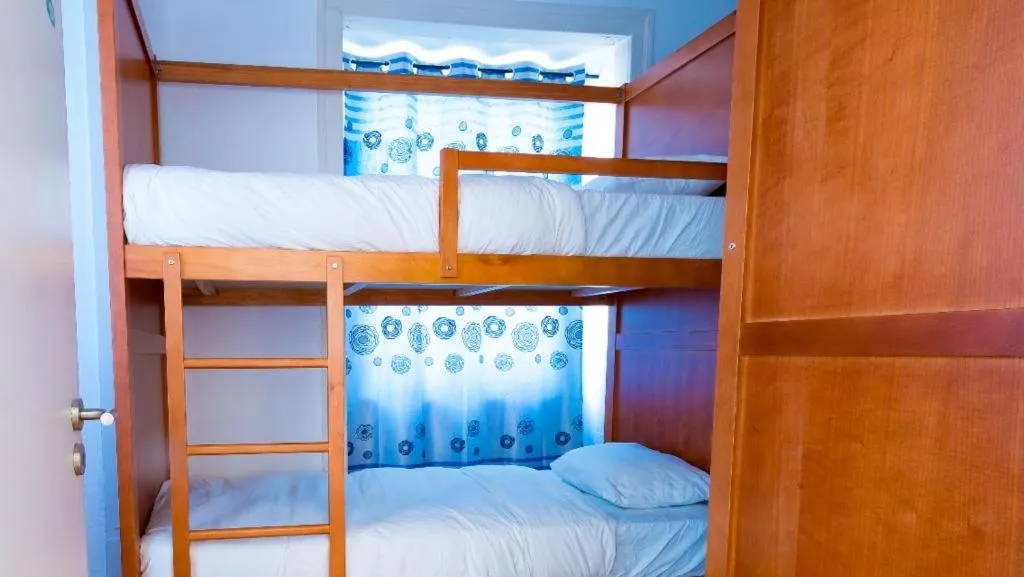 Bed in SwissLisbon Guest House