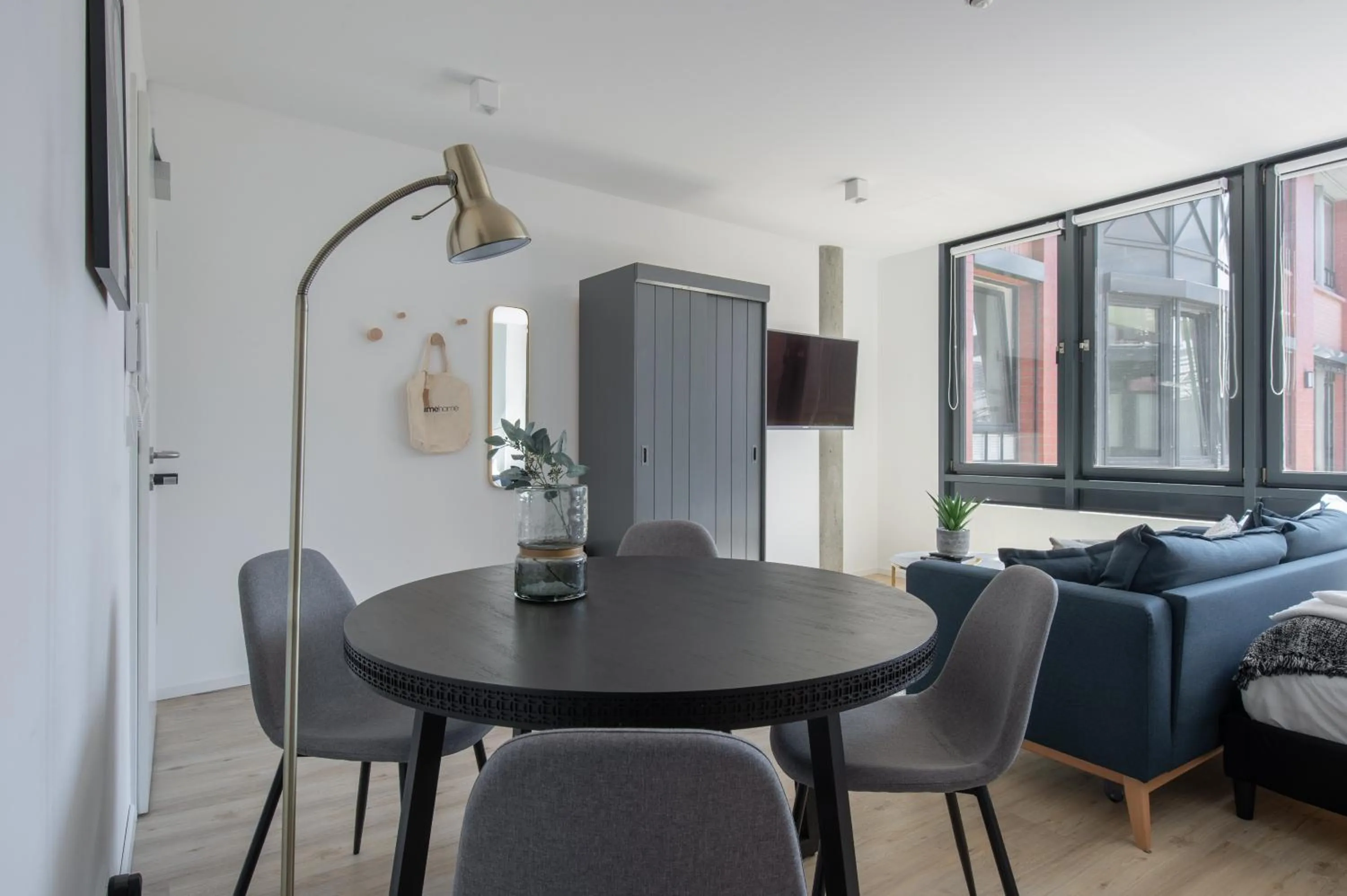 Seating area, Bed in Limehome Flensburg Holm