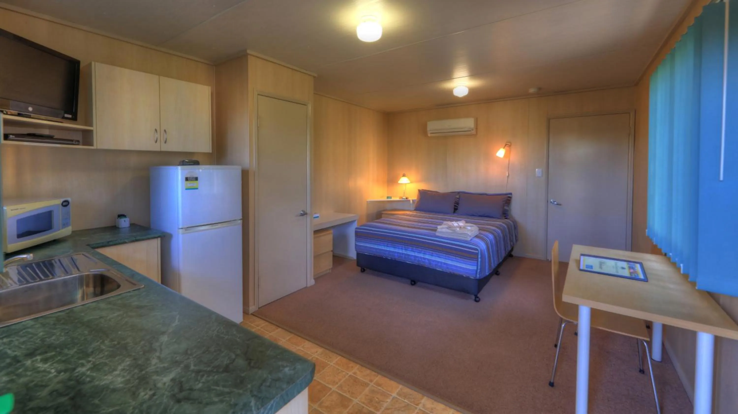 Bed in PepperTree Cabins, Kingaroy