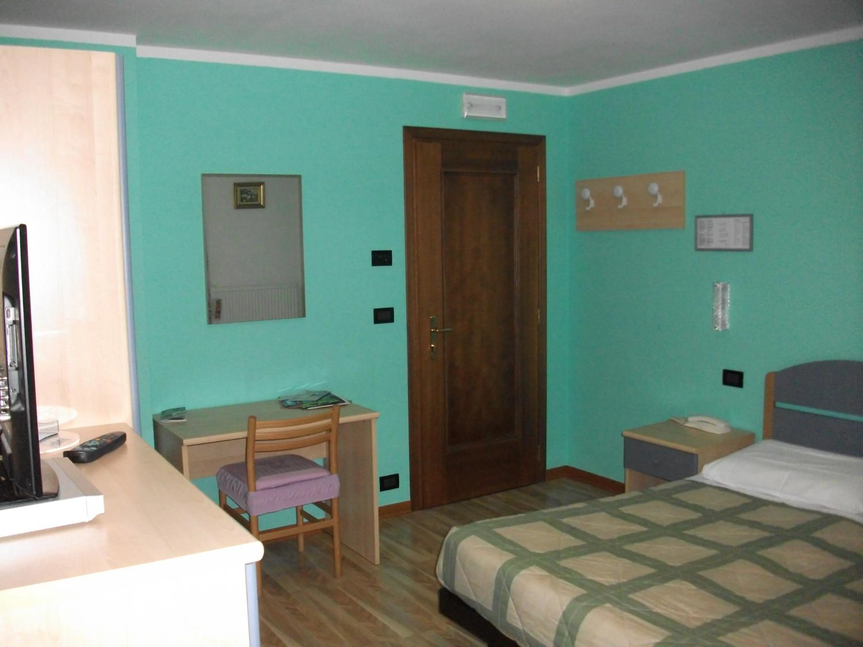 Bed in Hotel Genzianella