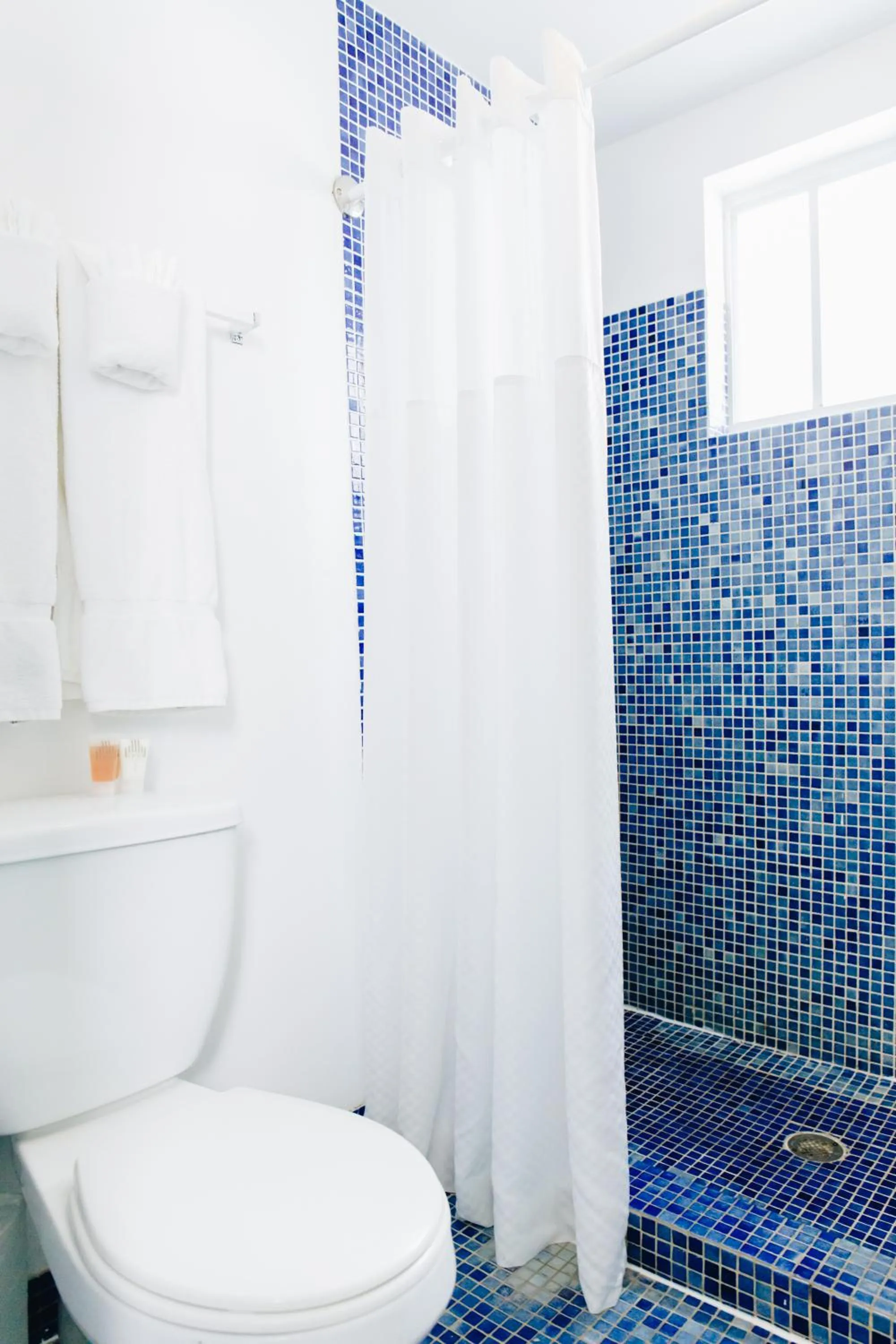 Bathroom in Aqua Hotel & Suites